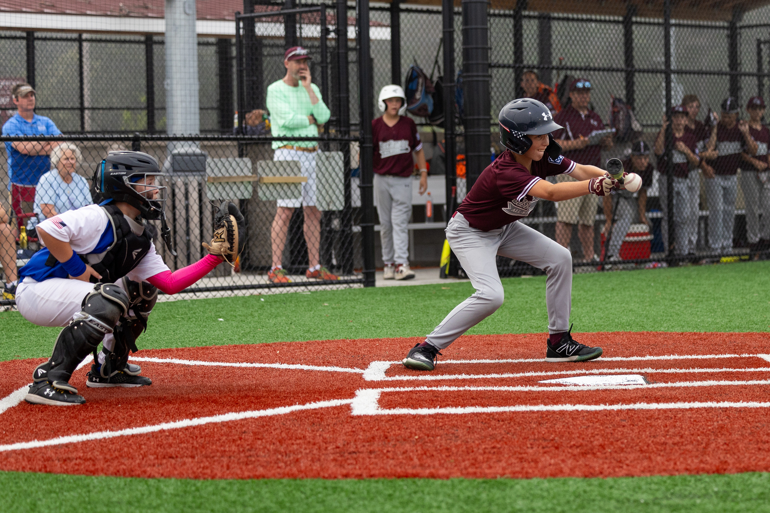 Alex Bobek lays down a bunt.   RON ESPOSITO