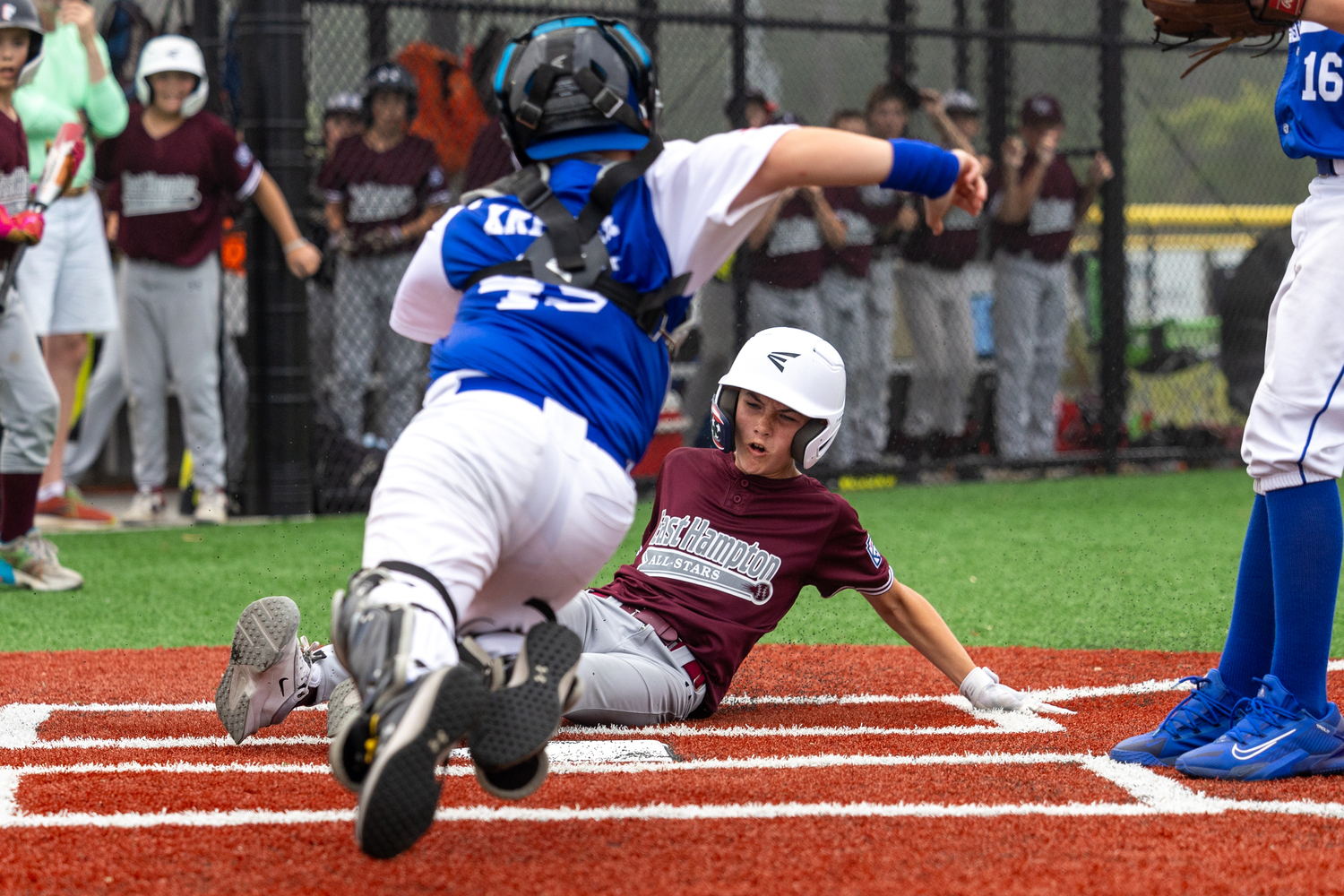 James Balnis slides into home for the game-winning run.  RON ESPOSITO