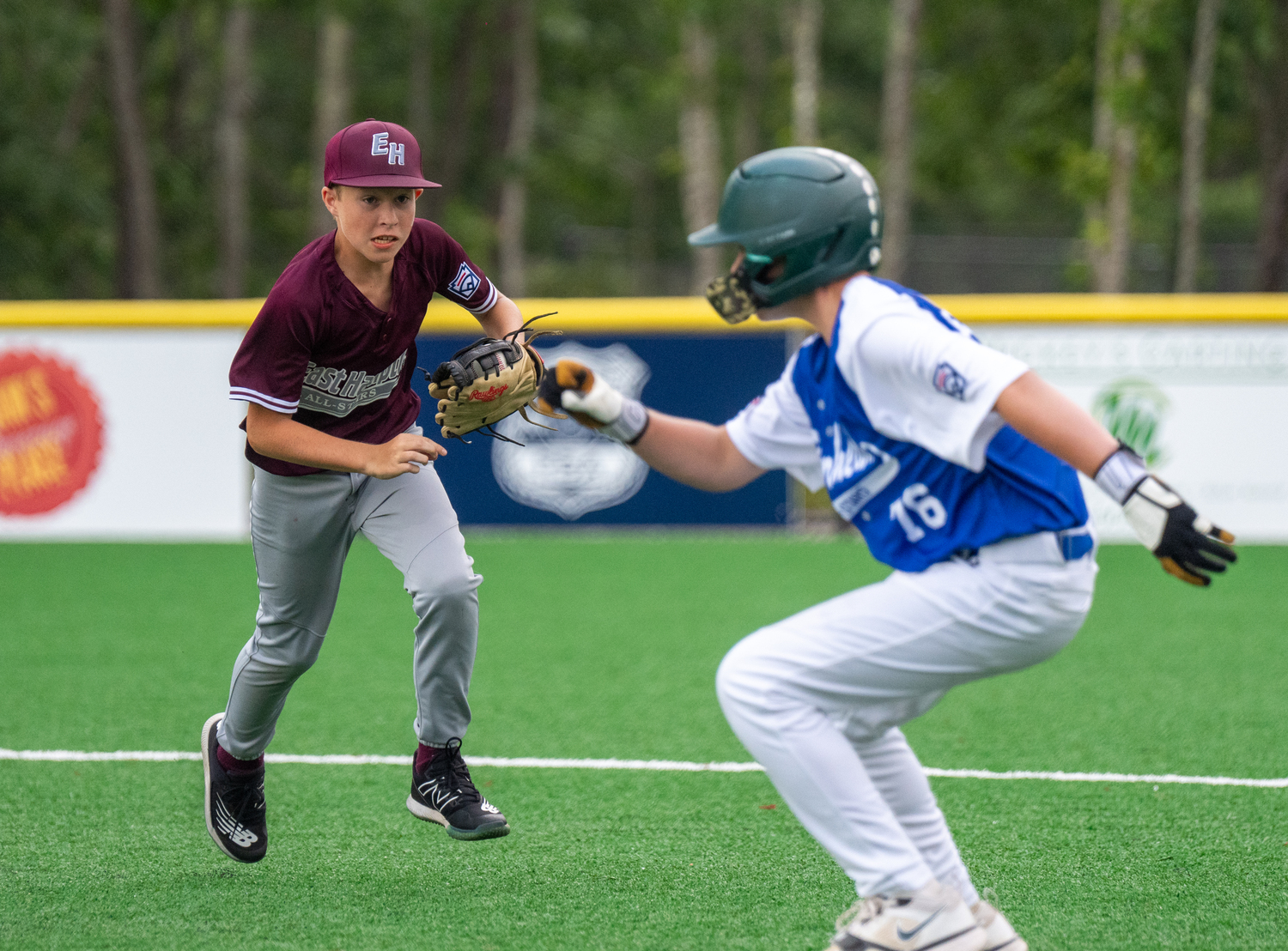 Owen Diamond chases a Riverhead base runner back to first.   RON ESPOSITO