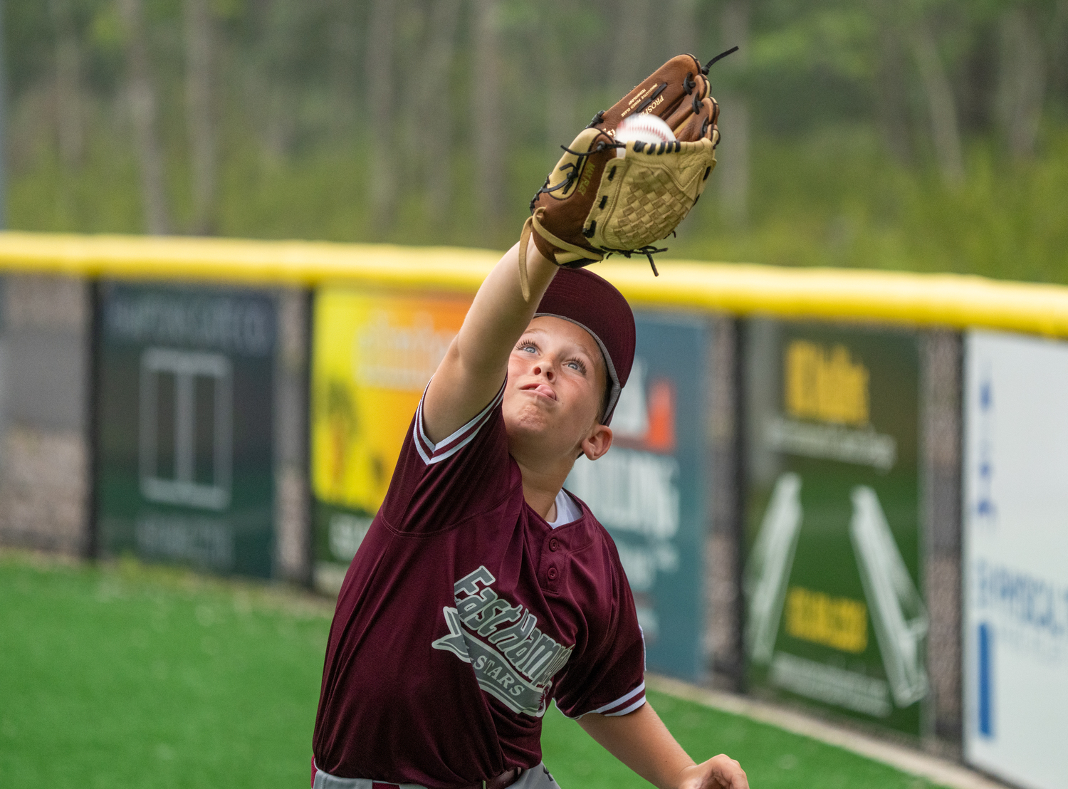 William Babinski makes a catch in the outfield.    RON ESPOSITO