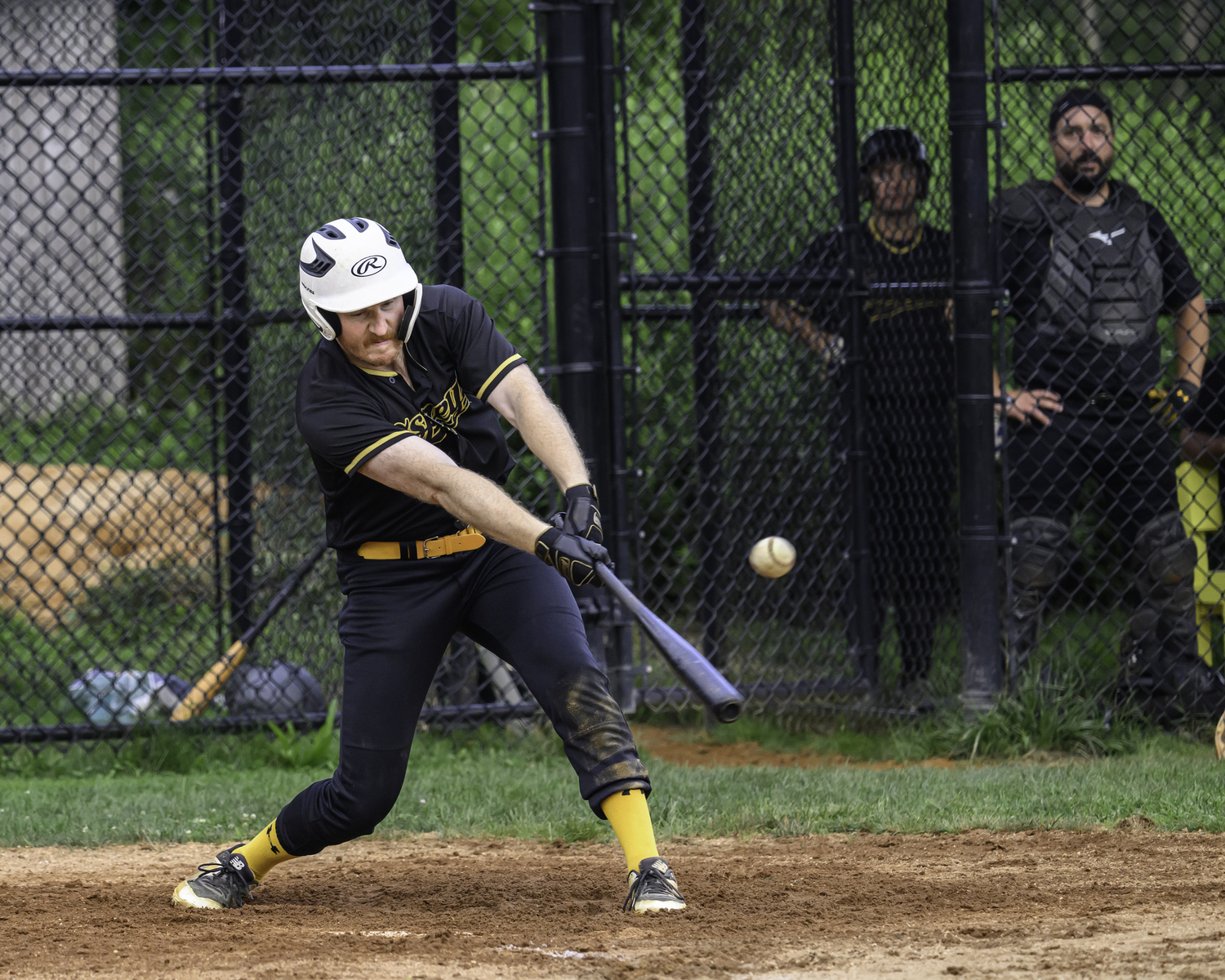 An Ospreys batter makes contact.  MARIANNE BARNETT