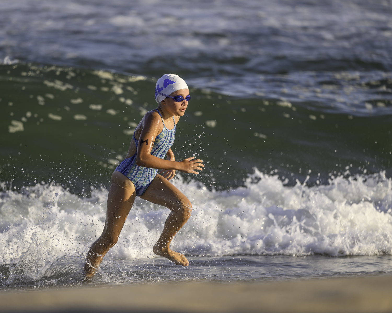 Evelyn Rizzo exits the water.   MARIANNE BARNETT