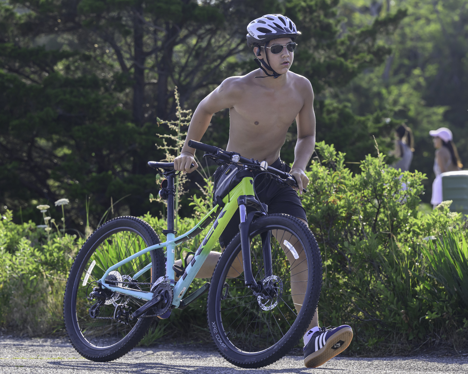 A teenager starts the 6-mile bike ride portion of the race.  MARIANNE BARNETT