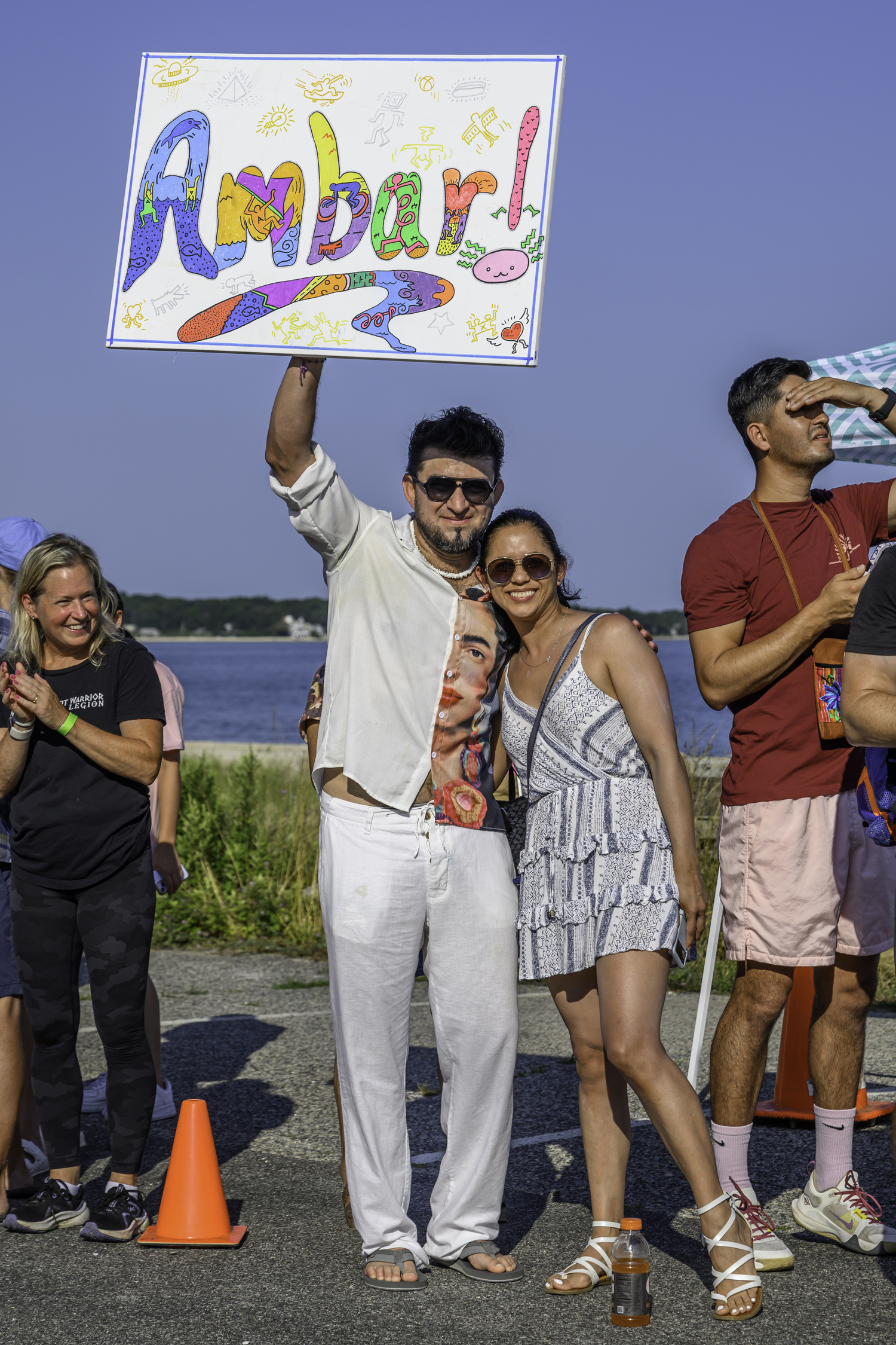 Fans of Ambar Reyes of East Hampton cheer her on.  MARIANNE BARNETT