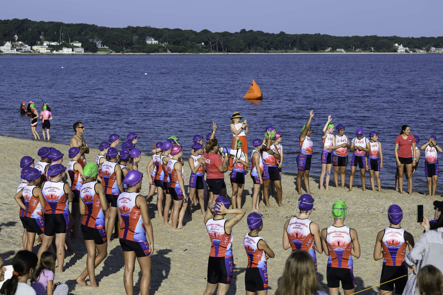 Theresa Roden, i-tri founder, gets the girls set for Sunday's race.   MARIANNE BARNETT