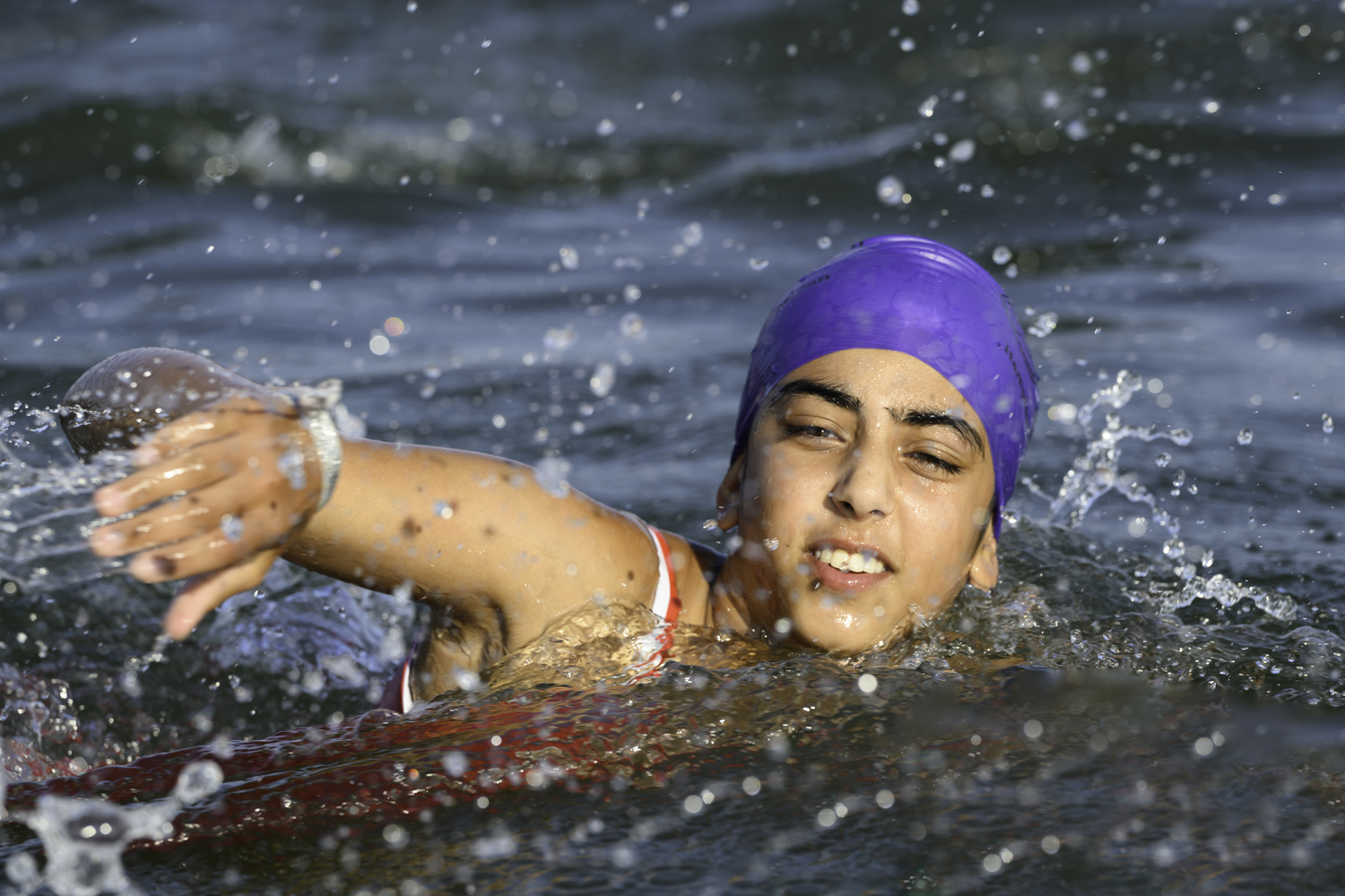 The triathlon starts with a 300-yard swim off Long Beach in Noyac.   MARIANNE BARNETT