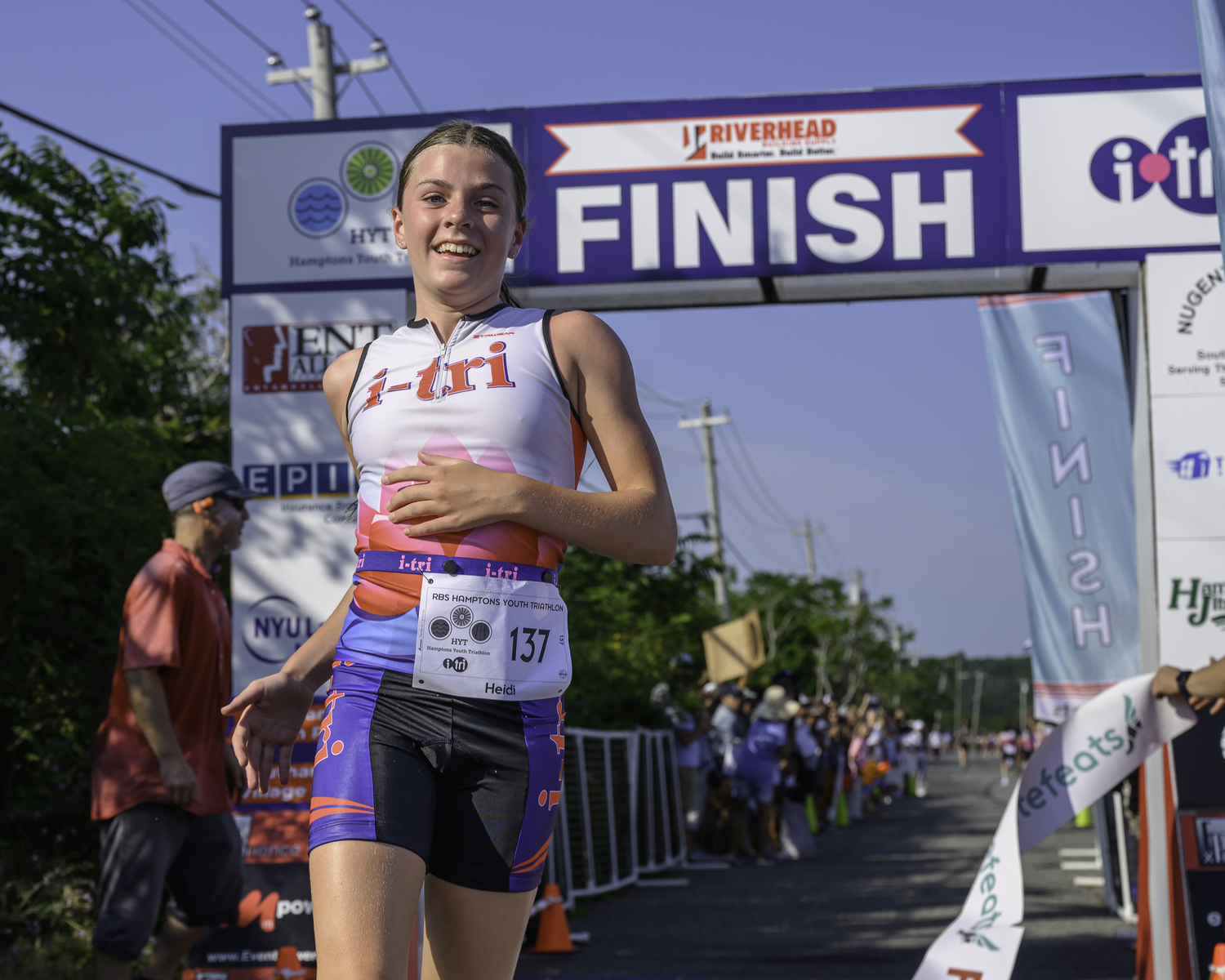 Heidi Rizzo was the first i-tri member to cross the finish line on Sunday morning.  MARIANNE BARNETT