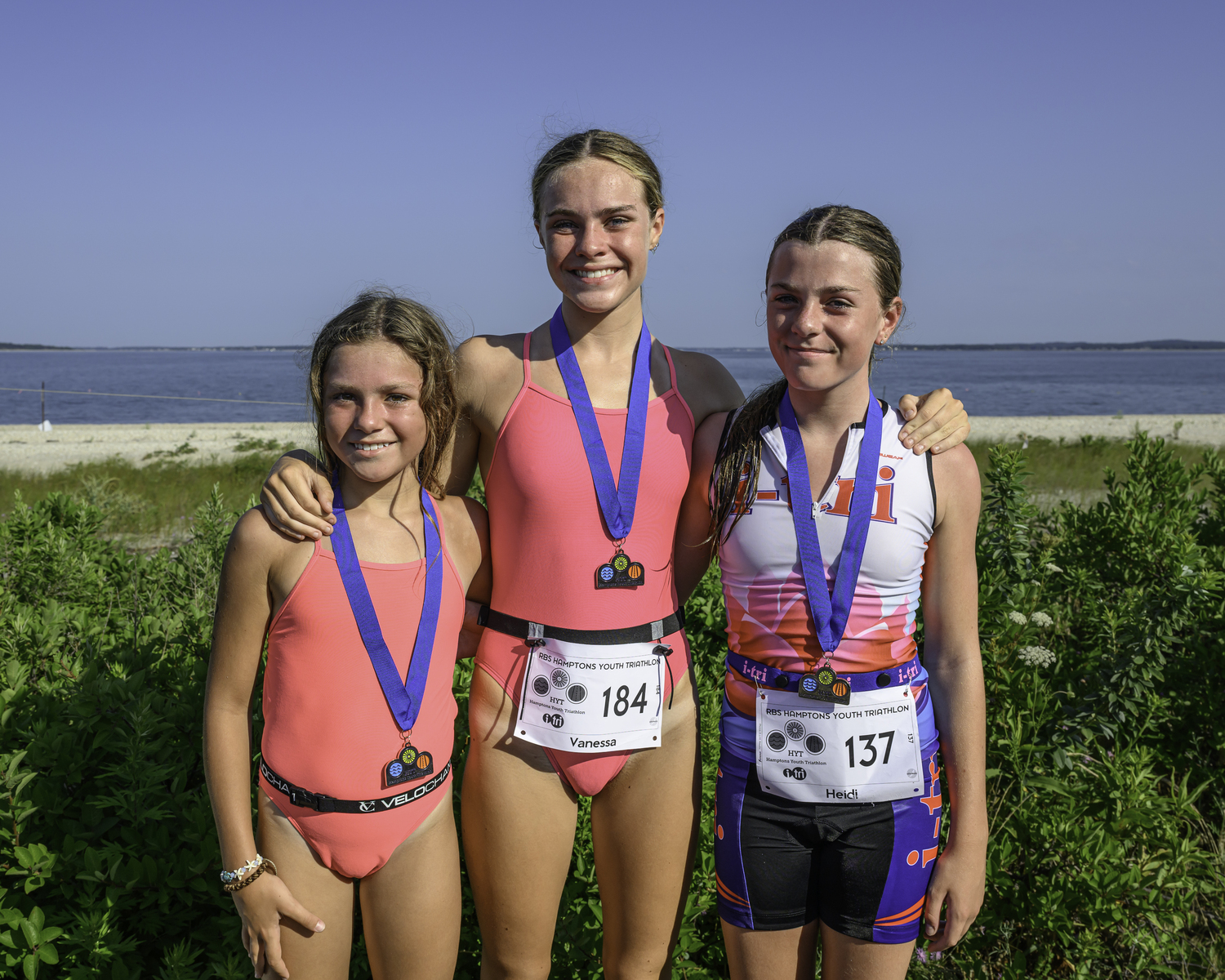 The Rizzo sisters, Evelyn, left, Vanessa and Heidi. All three were winners on Sunday, in some shape or fashion. Evelyn was the top performer in her 10-and-under age group, Vanessa was the overall champion and Heidi was the first i-tri member to finish.   MARIANNE BARNETT