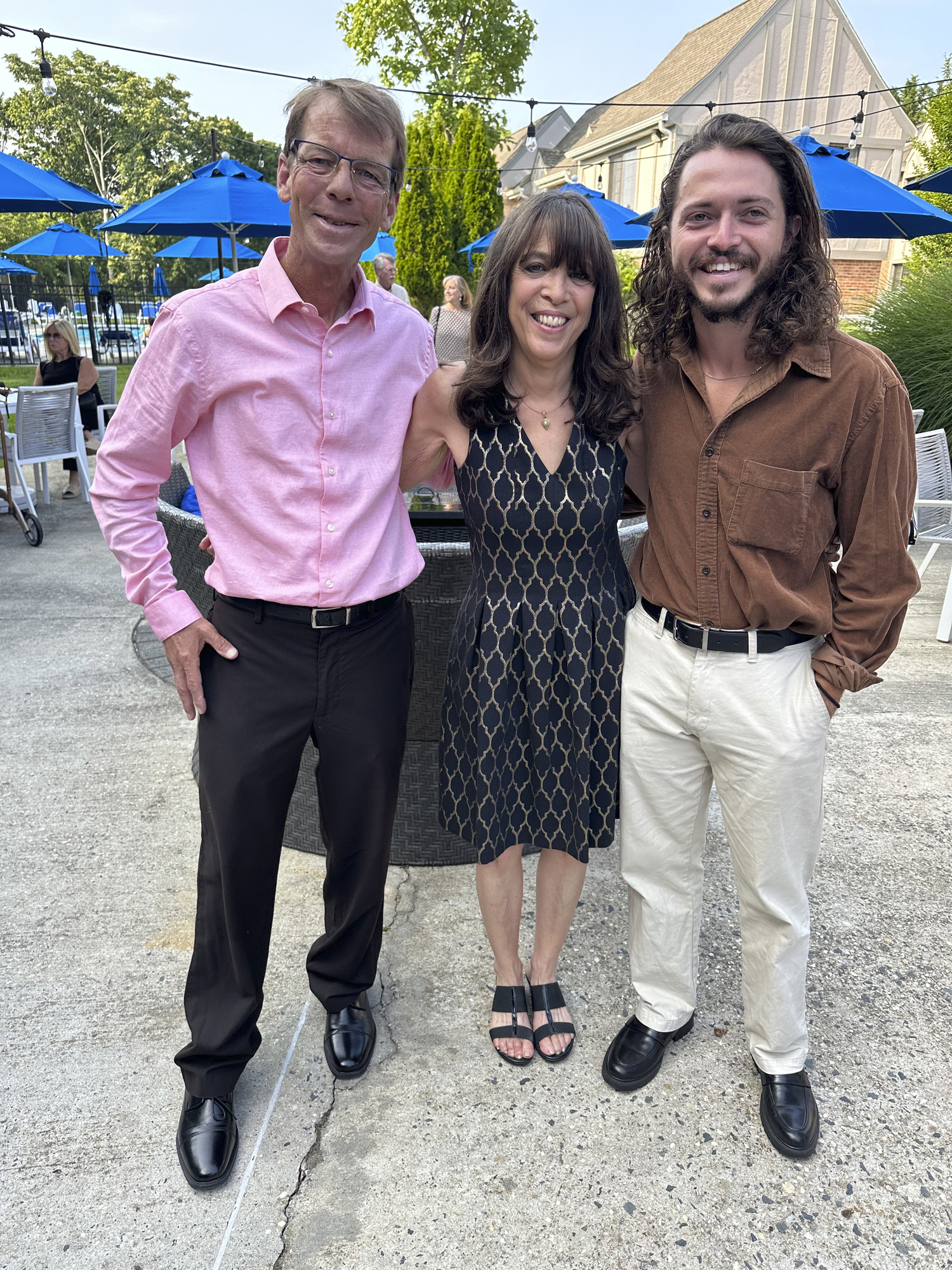 Dan O'Shea, Sara Blue and Dylan Blue at Maureen's Haven cocktail party.  GREGORY D'ELIA