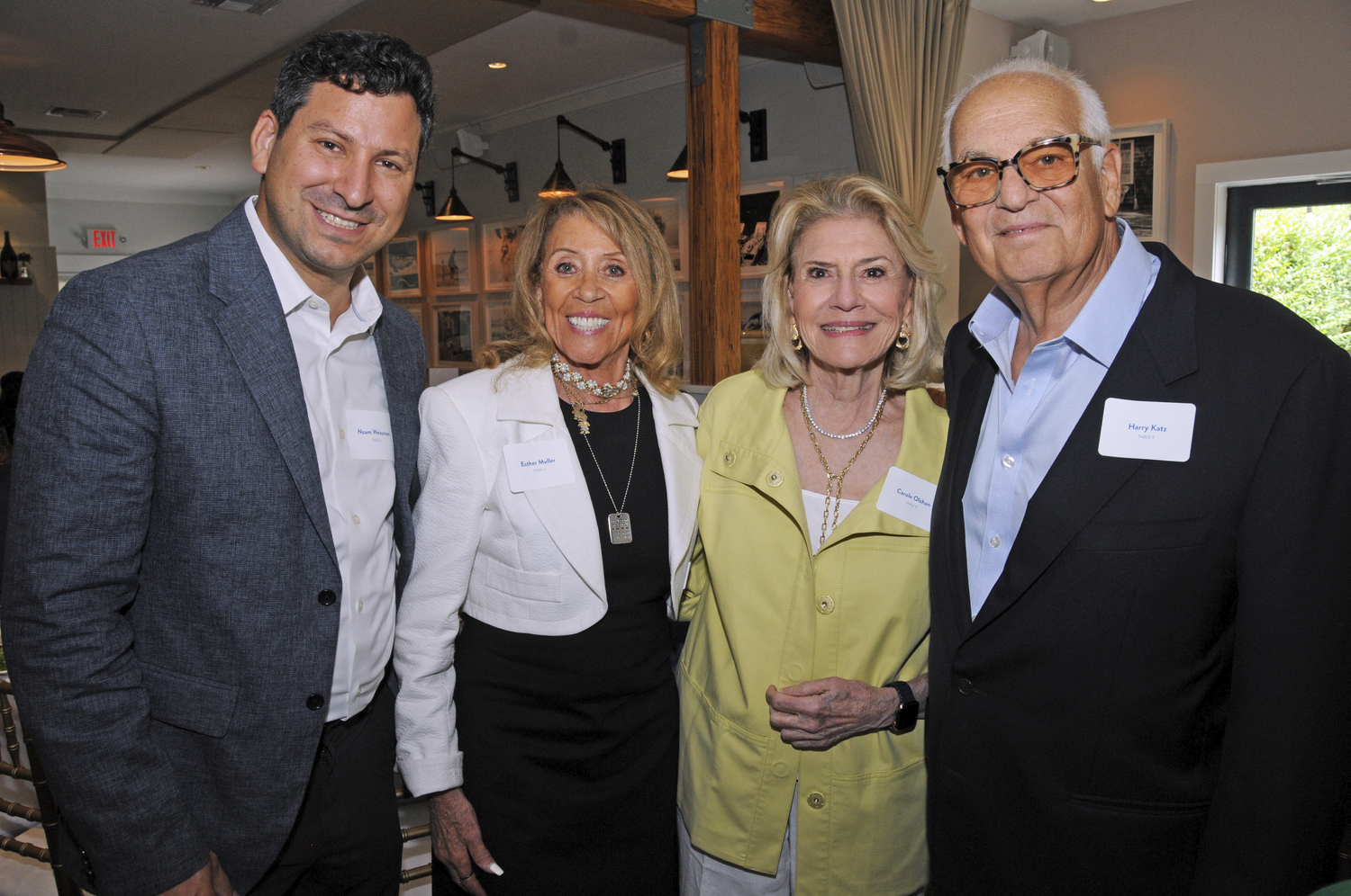 Guest Speaker Noam Weissman, Honoree Esther Muller, Luncheon Committee Member Carole Olshan and Jewish Center of the Hamptons  President Harry Katz at the center's annual luncheon on July 5 at the Highway Restaurant in East Hampton.  RICHARD LEWIN