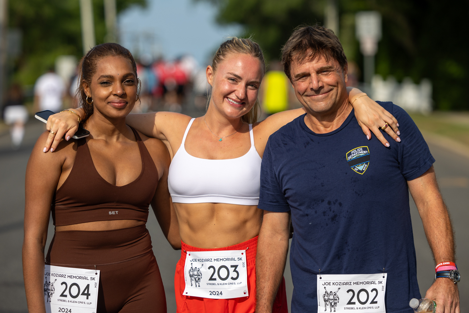 Chandler Dewgard, left, Megan Coll and Bob Berger.  RON ESPOSITO