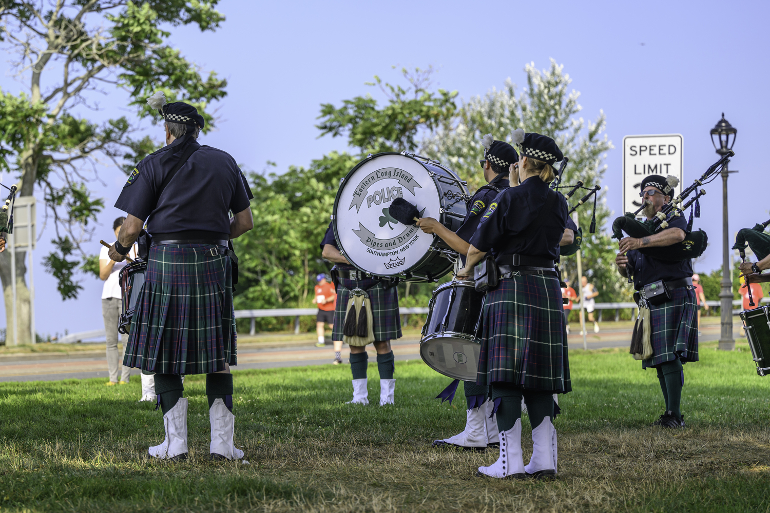 The Eastern Long Island Police Pipes and Drums play at Lance Cpl. Jordan Haerter Veterans' Memorial Bridge.   MARIANNE BARNETT