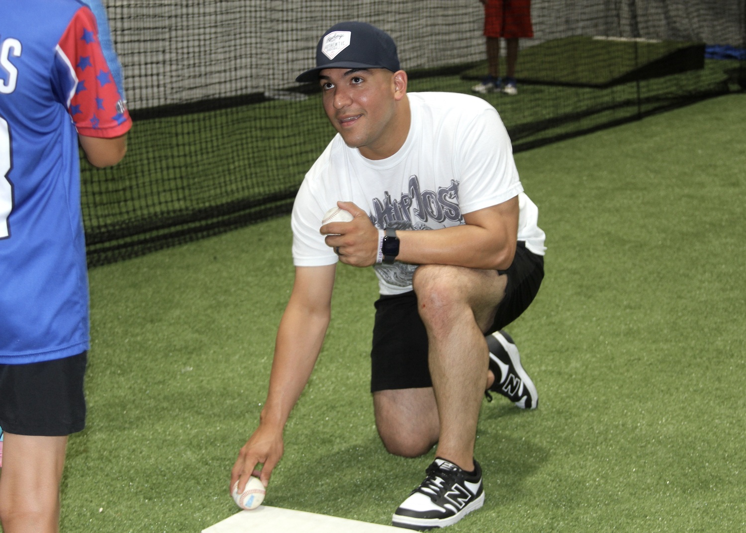 New York Yankees catcher Jose Trevino imparts catching tips on members of the Westhampton Warriors 12U baseball team. DESIRÉE KEEGAN