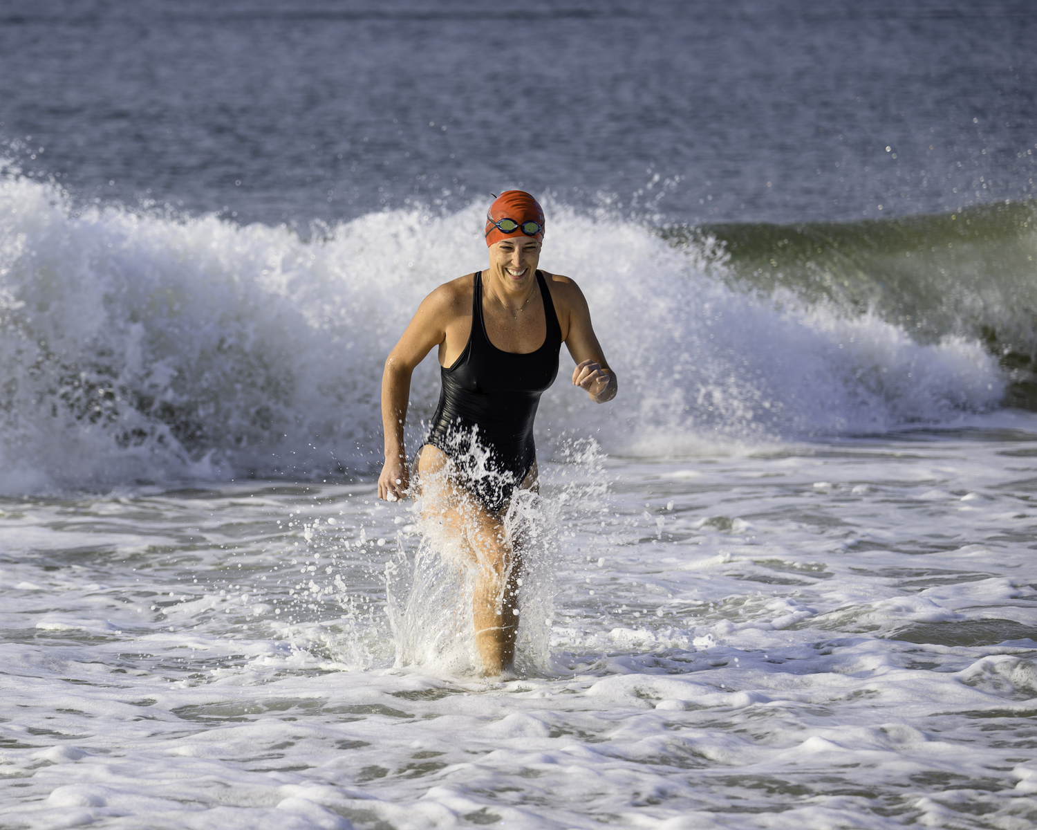 Kacey Mallinson was the first woman to finish the 1-mile swim on Saturday.   MARIANNE BARNETT