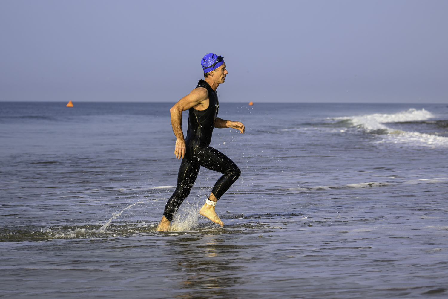 A swimmer finishes the 2-mile swim.  MARIANNE BARNETT