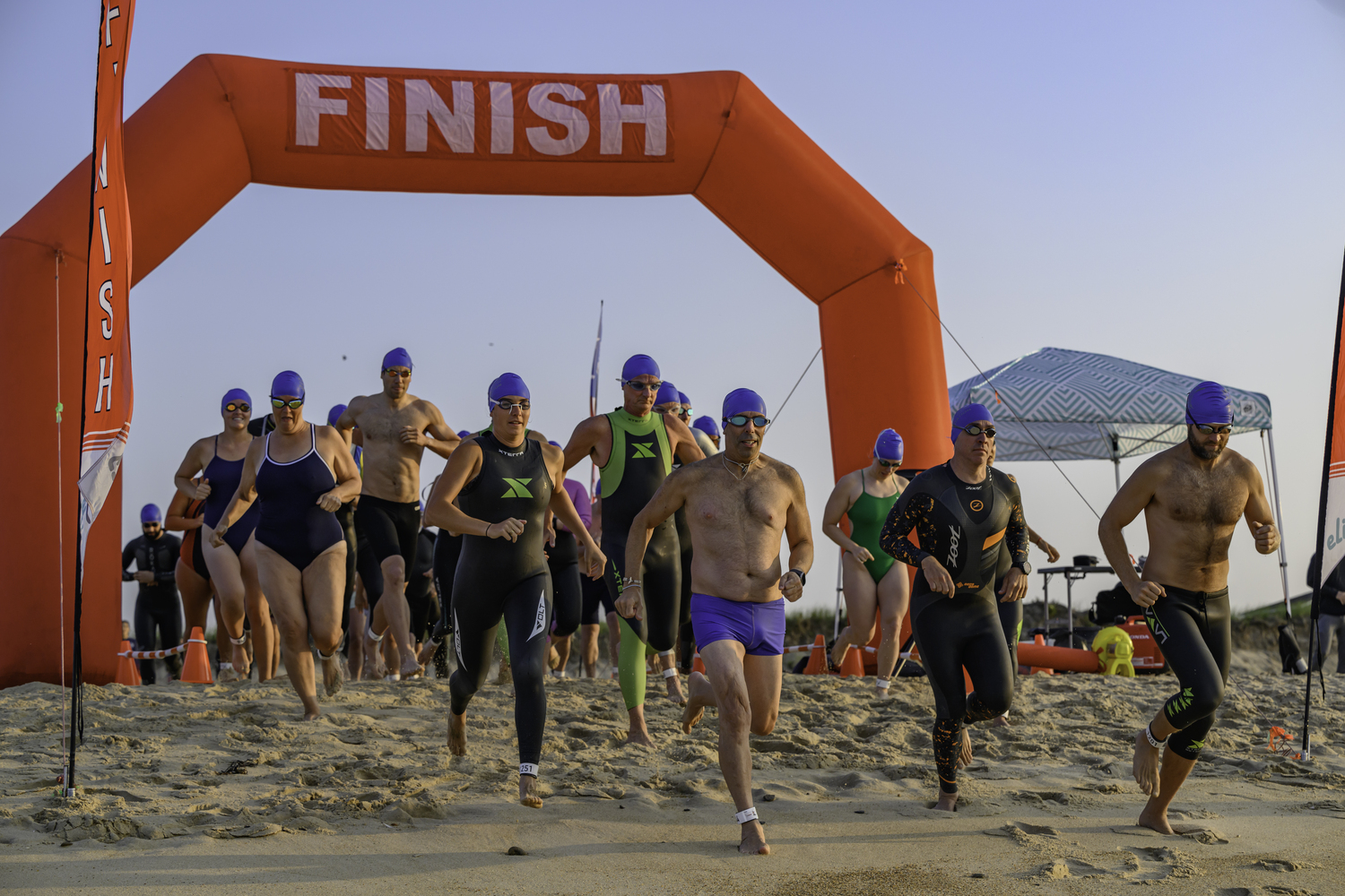 The 2-milers get things started at Kirk Park Beach in Montauk for this year's open water swim on Saturday morning.   MARIANNE BARNETT