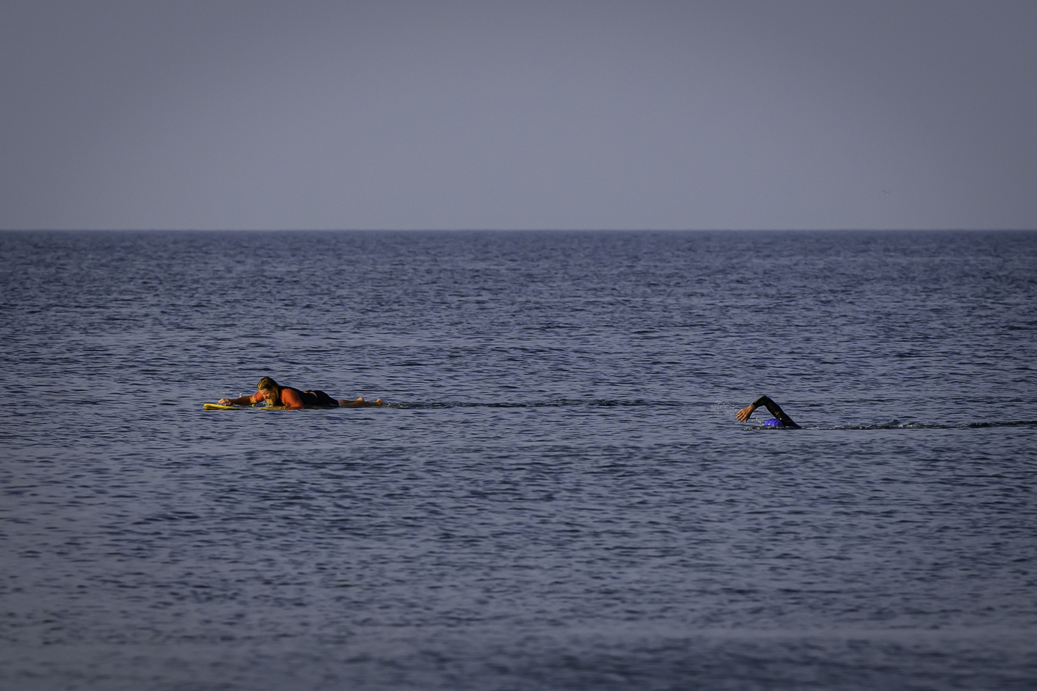 East Hampton Volunteer Ocean Rescue keeps an eye on 2-mile leader Michal Petrzela.  MARIANNE BARNETT