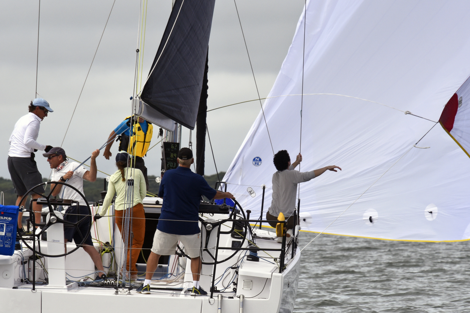 Odyssey’s Ray Pepi steers a perfect new course as his crew jibes the spinnaker.   MICHAEL MELLA