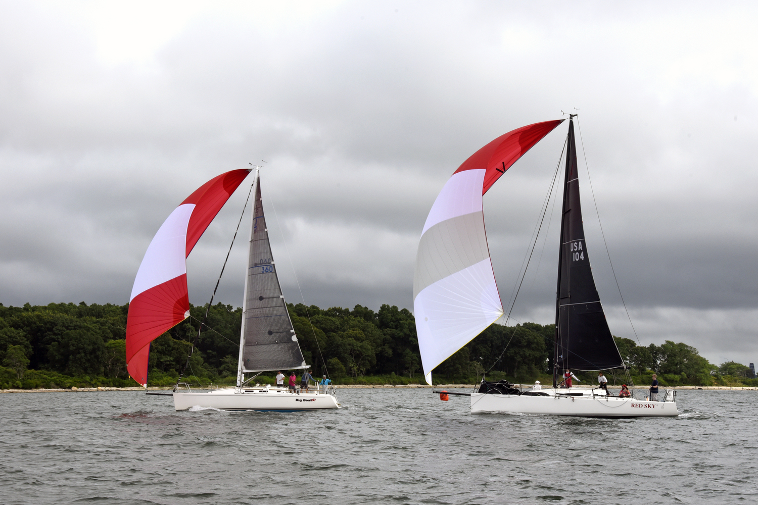 Big Boat edges out Red Sky by mere seconds after racing for 15 nautical miles to win first place in PHRF Spinnaker Division 1.  MICHAEL MELLA