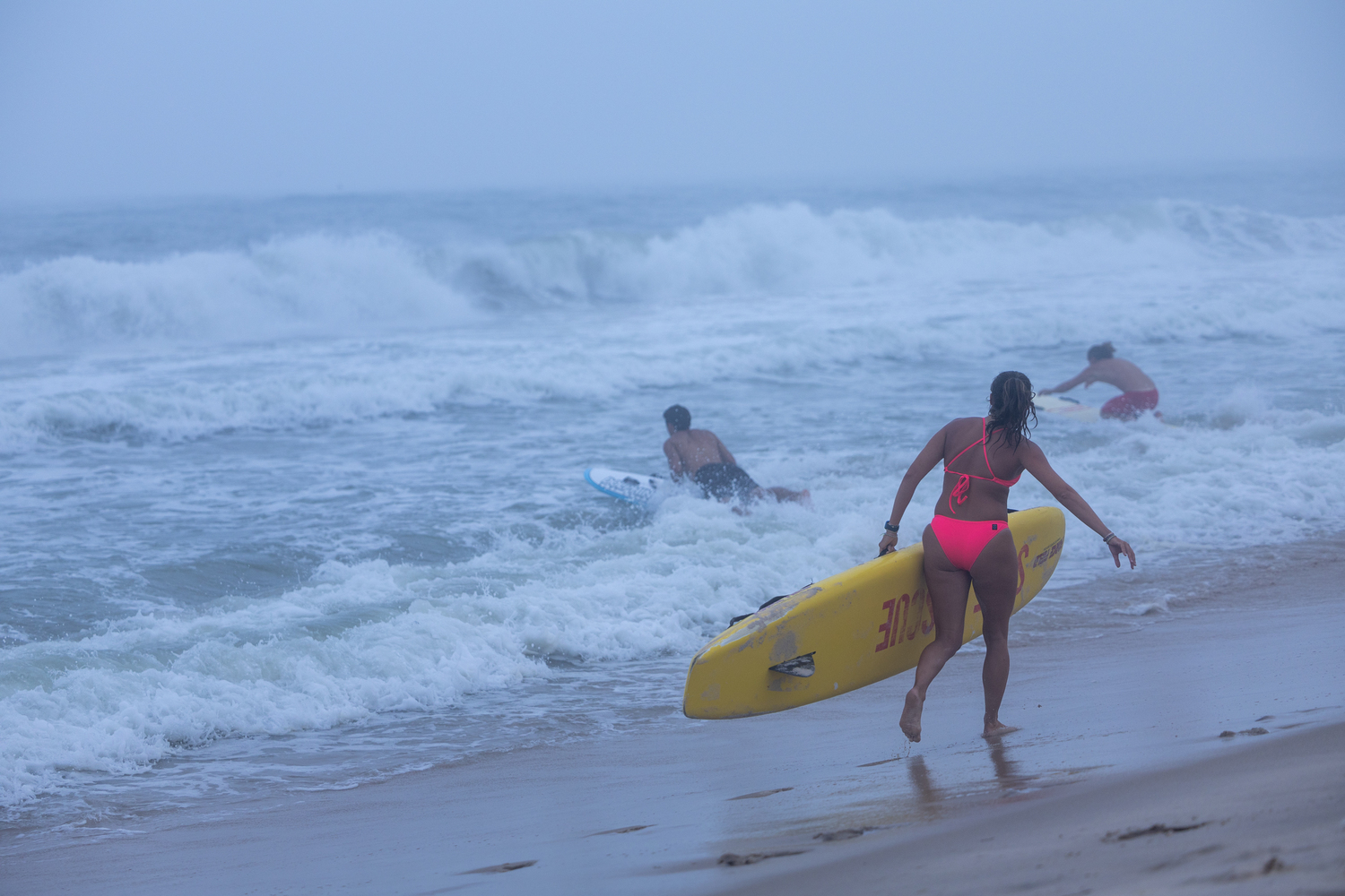 The lifeguards battle rough waves and swells on July 17. The landline rescue was cancelled because of the rough surf.   RON ESPOSITO