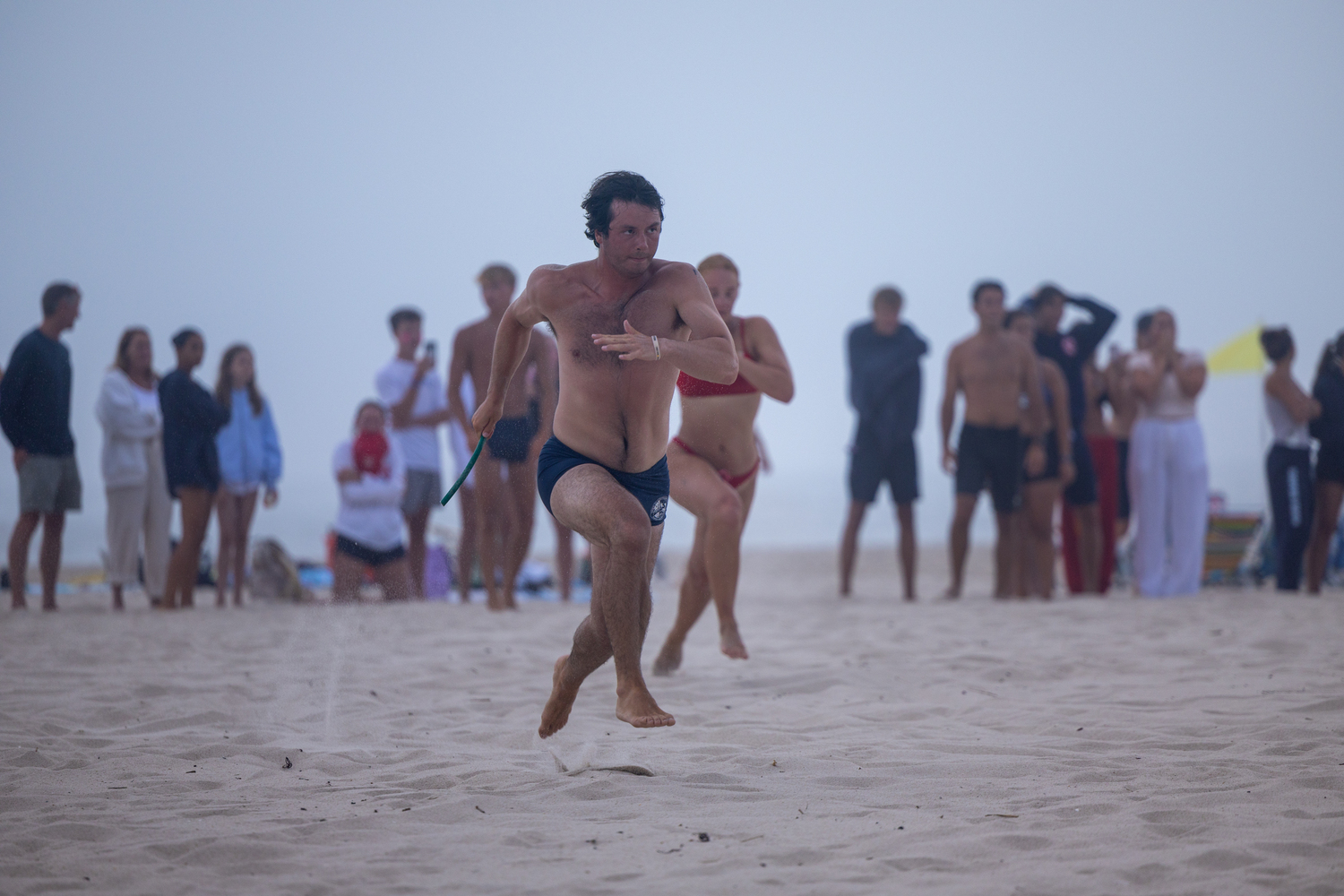 Jimmy Moran competes in the 4x100 relay.   RON ESPOSITO