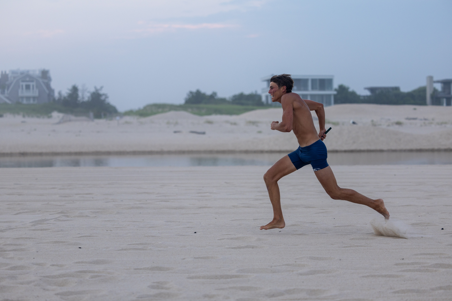 A guard competing in the 4x100 relay.   RON ESPOSITO