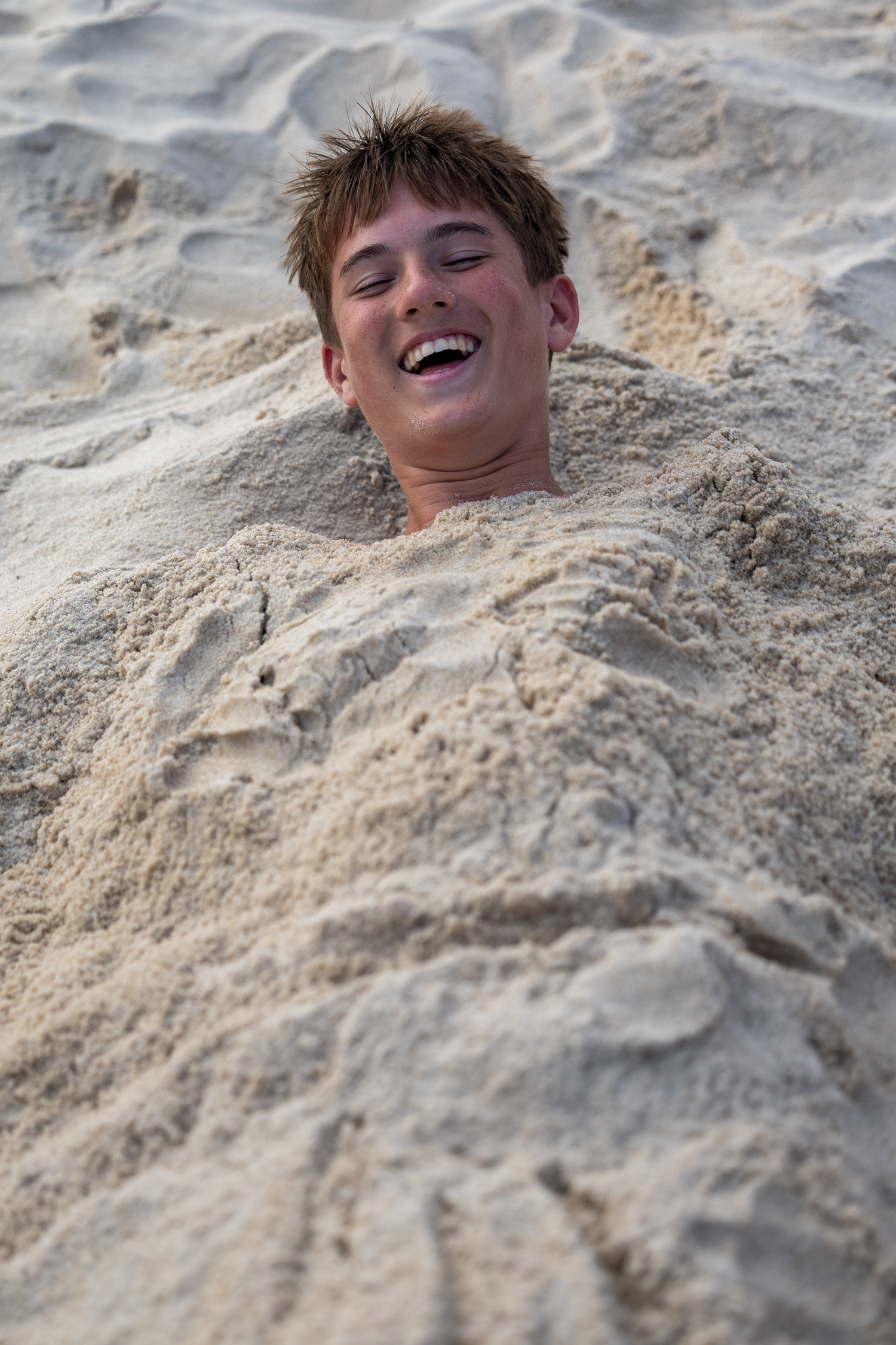 Having a great time in the sand. RON ESPOSITO