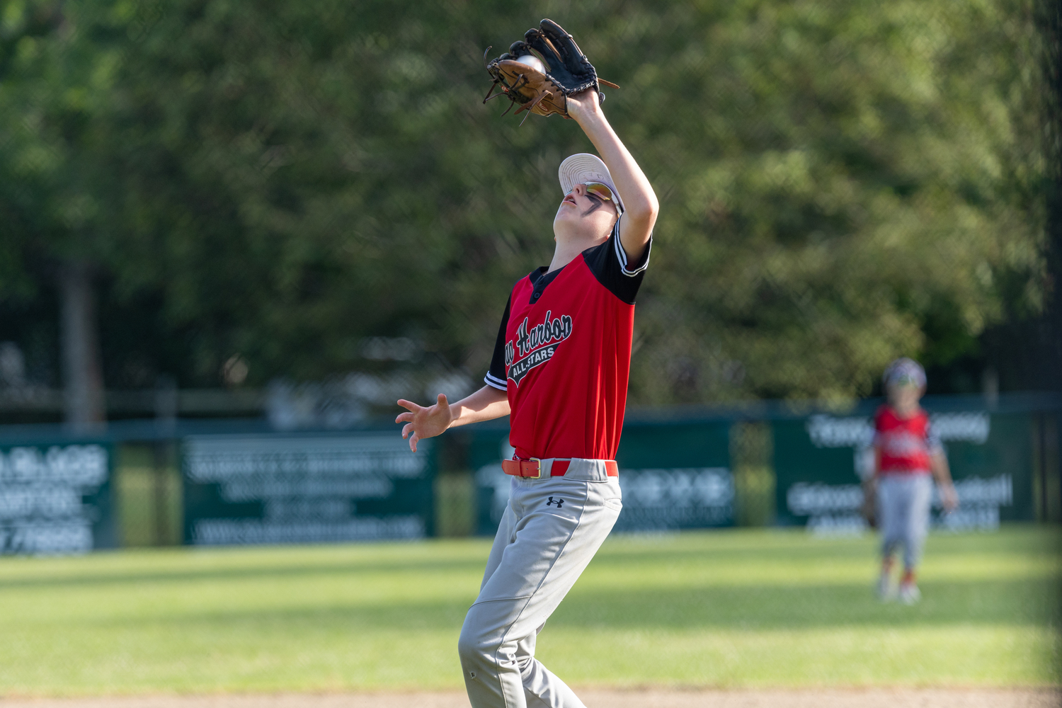 Cade Fischer catches a pop fly.   RON ESPOSITO