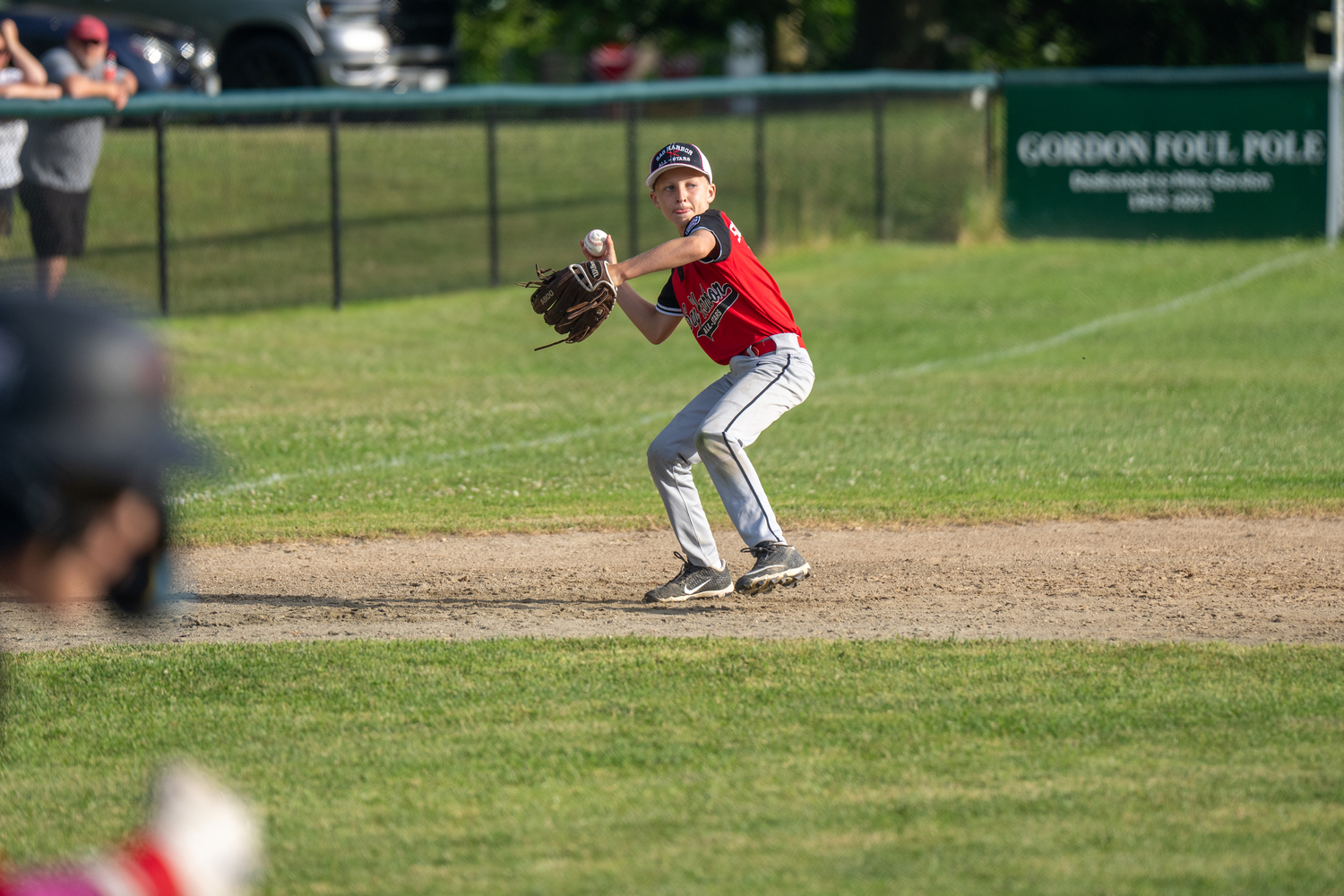 Frank Sokolowski looks to make the long throw from third base.   RON ESPOSITO