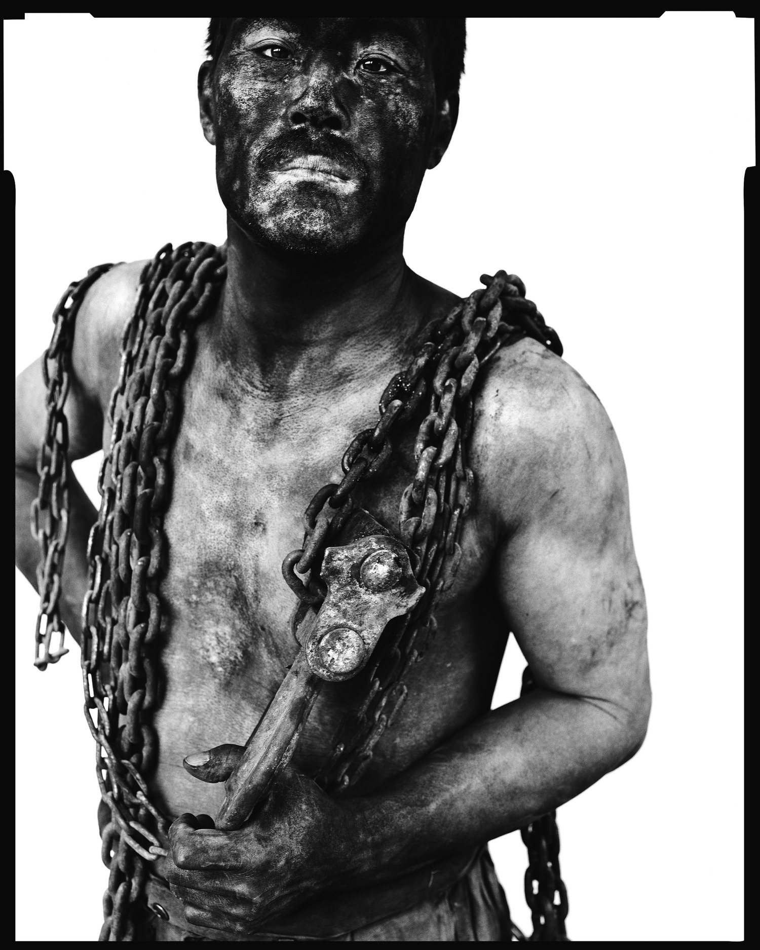 A coalminer in China's Shandong Province is depicted in COAL + ICE at the Asia Society in Manhattan. SONG CHAO