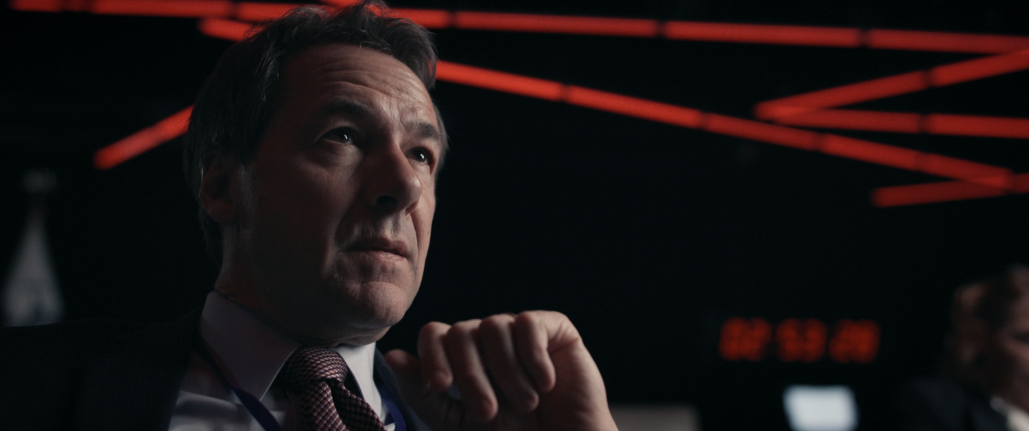 In a hypothetical war game set in the White House Situation Room, President-elect John
Hotham (played by former Montana Governor Steve Bullock) confronts an insurrection
involving active-duty military on January 6, 2025. As seen in WAR GAME, directed by
Jesse Moss and Tony Gerber. WOLFGANG HELD/COURTESY OF SUBMARINE DELUXE 1