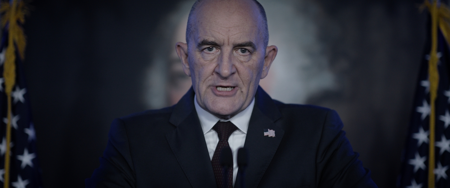 Retired US Army Lt. General Roger Simms (played by actor Ralph Brown), known as
“the Patriarch,” leader of the “Order of Columbus, an anti-democratic paramilitary
organization. As seen in 