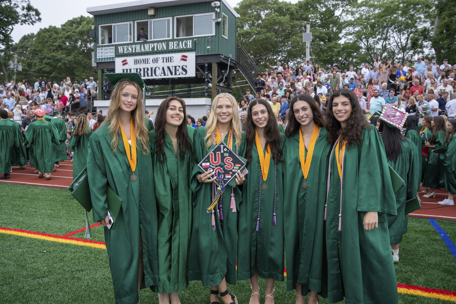 Graduates celebrate after Westhampton Beach High School commencement on June 26.    RON ESPOSITO