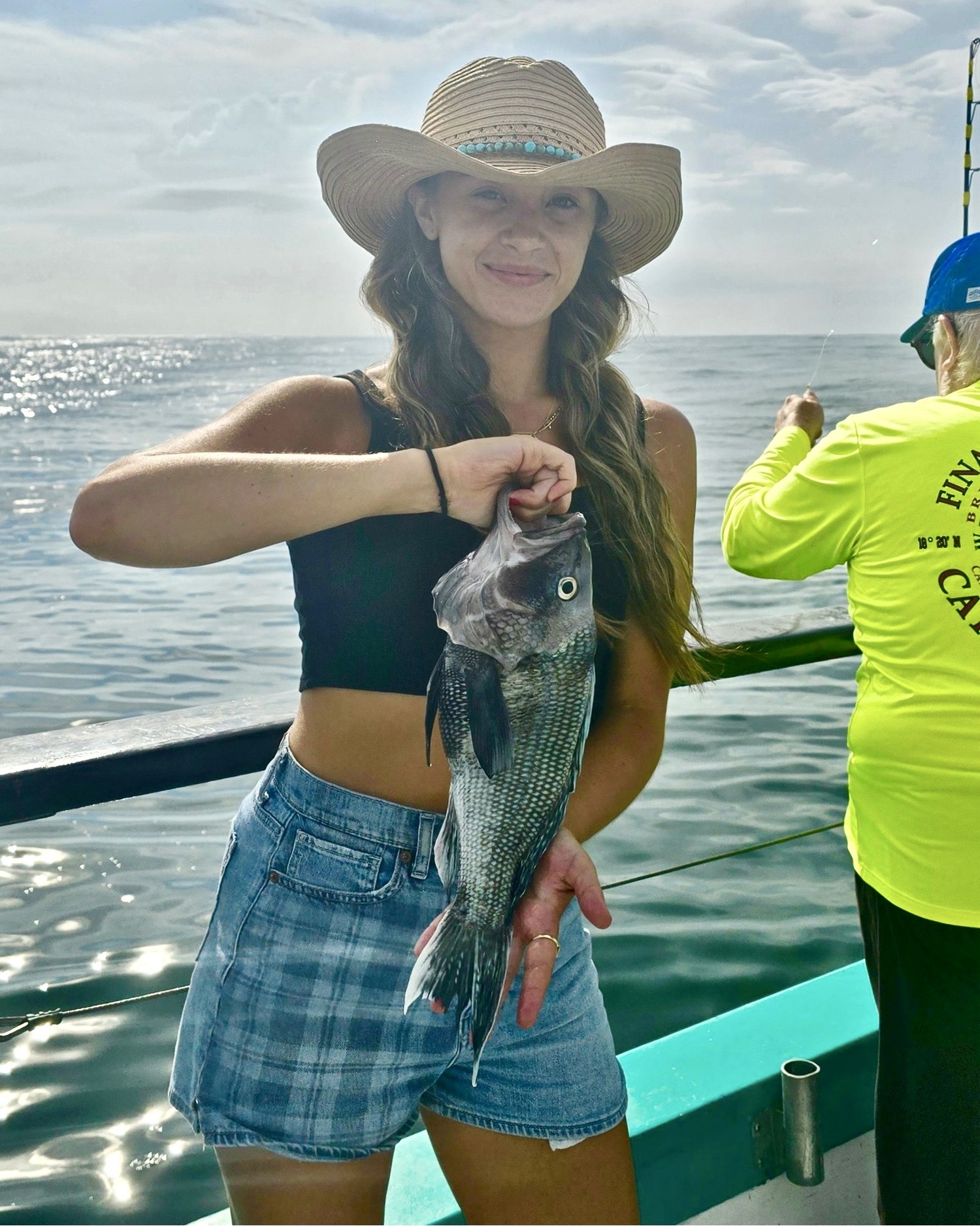 Sam Ratkewitch with a pool-winning black sea bass caught while fishing with the Viking Starlite off Montauk. COURTESY THE VIKING FLEET