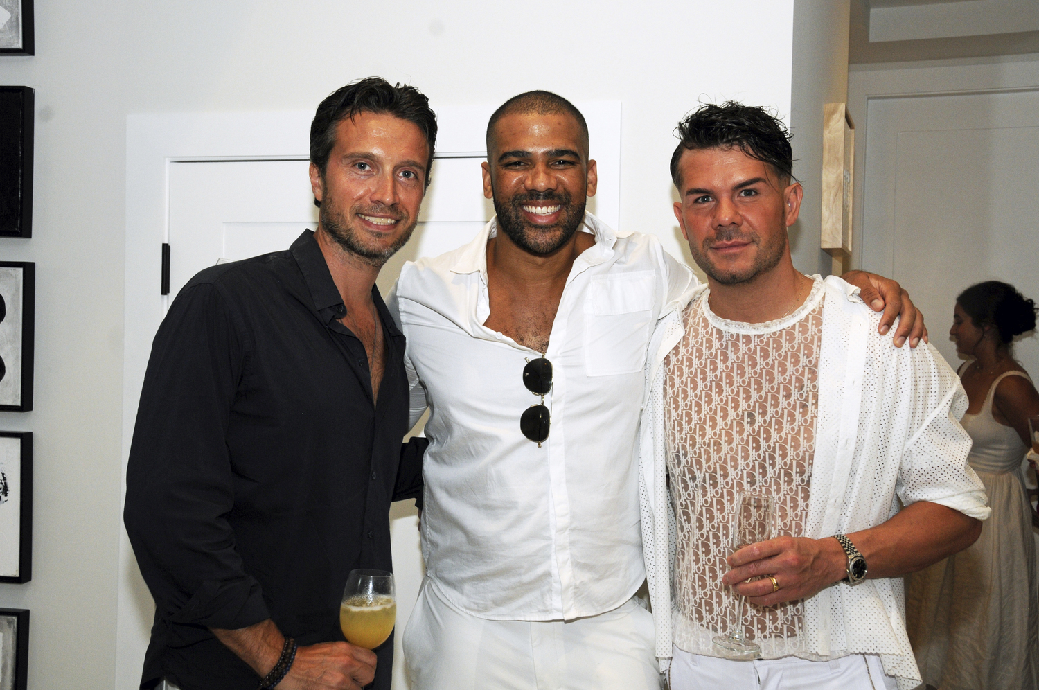 Dominic Couzens, Adriel Reboh and Pietro Simone at the Holiday House Hamptons Designer Showhouse White Party on Saturday in  White Party in Bridgehampton.  RICHARD LEWIN