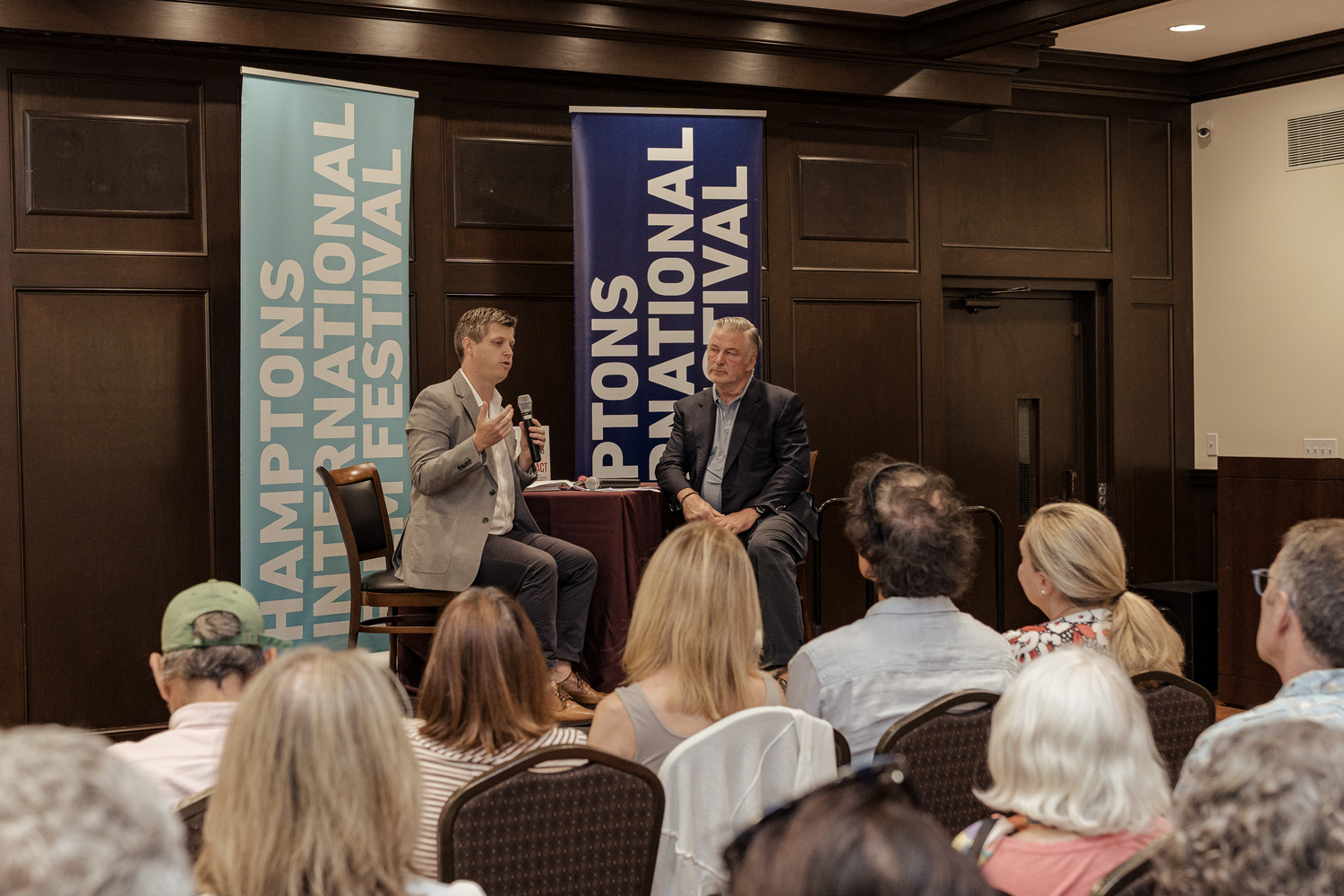 Michael Sheldrick, co-founder of Global Citizen, and Alec Baldwin, HIFF board member (and chair emeritus) in discussion at East Hampton Library on August 23. COURTESY HIFF