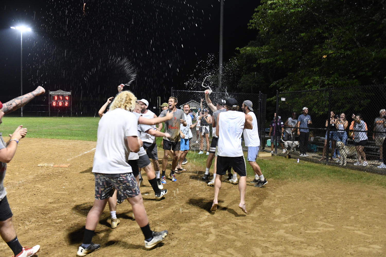 The Raptors celebrate their walk-off win on Sunday night.   DOUG KUNTZ