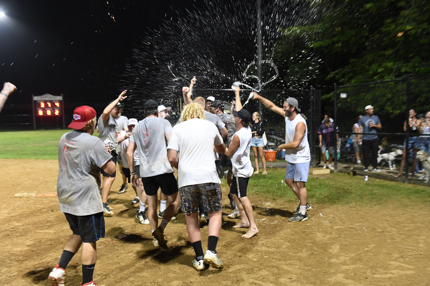 The Raptors celebrate their walk-off win on Sunday night.   DOUG KUNTZ