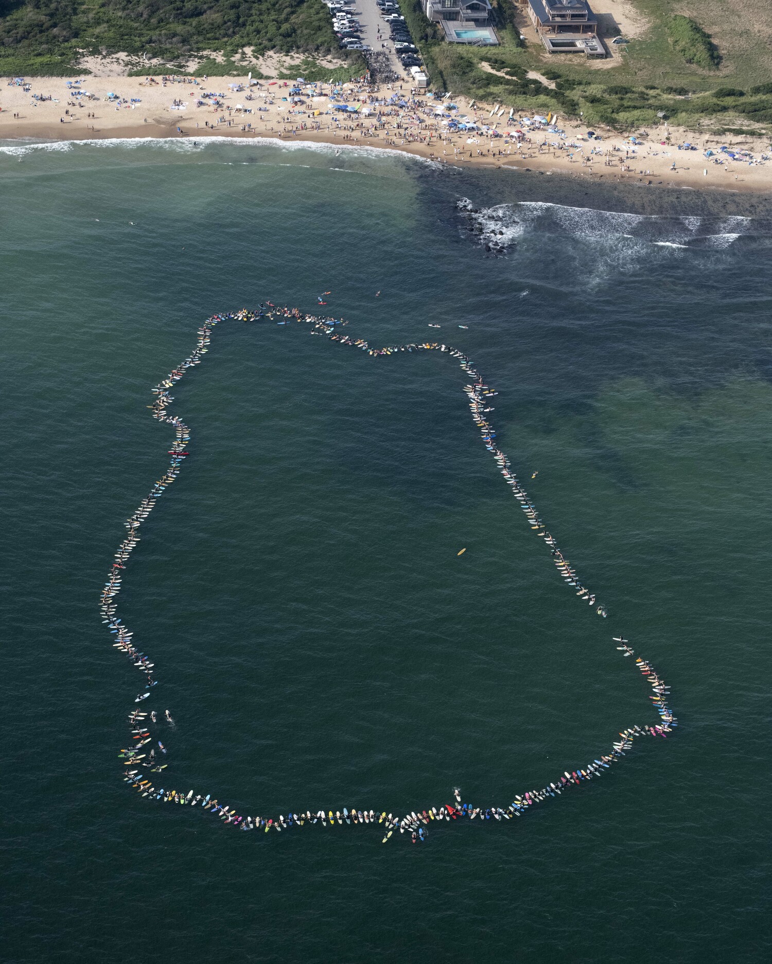 Sunday's paddle out for Andrew Blauschild.  DOUG KUNTZ