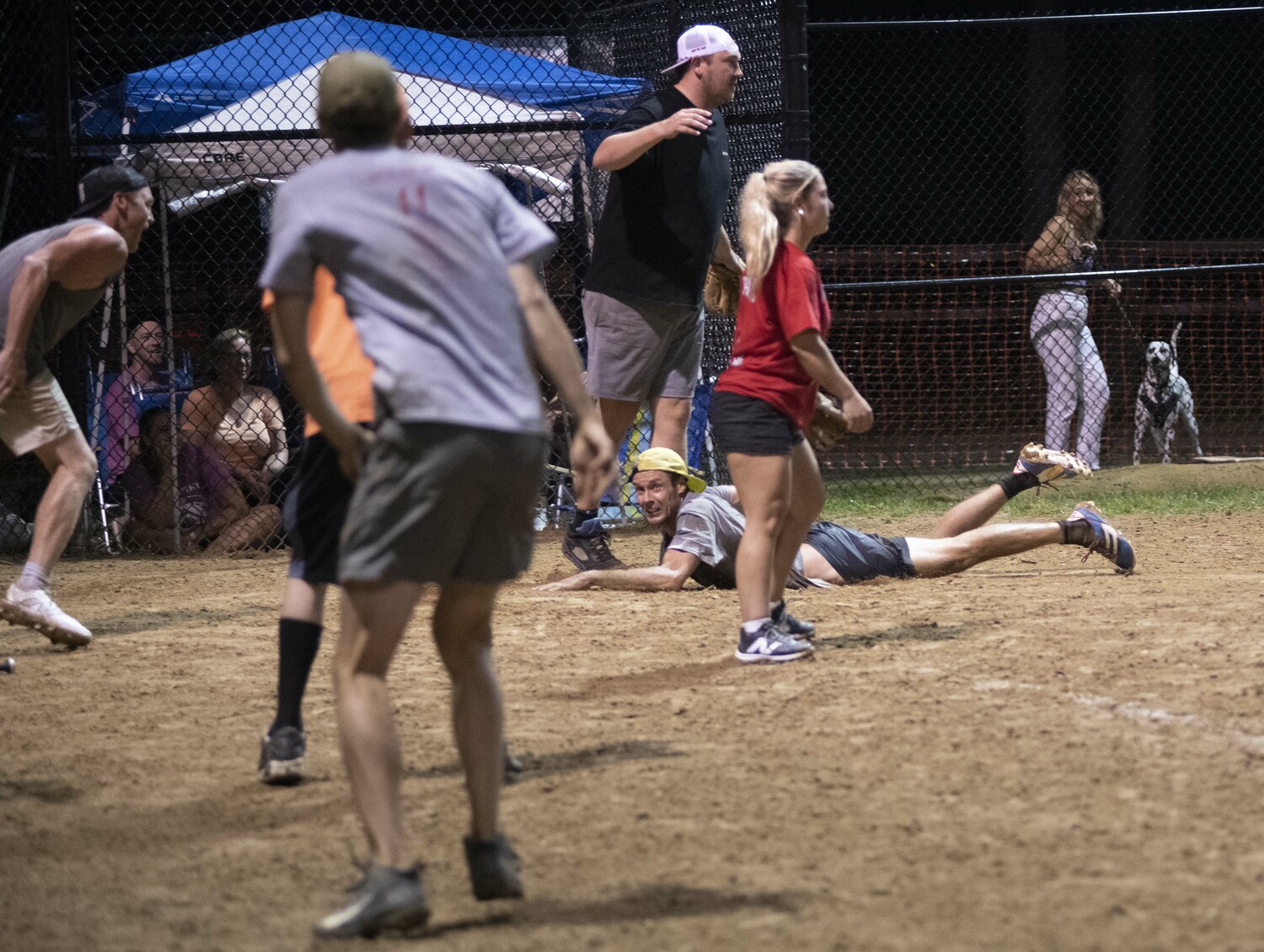 Colin Davis scores the winning run for the Raptors Sunday night.   DOUG KUNTZ