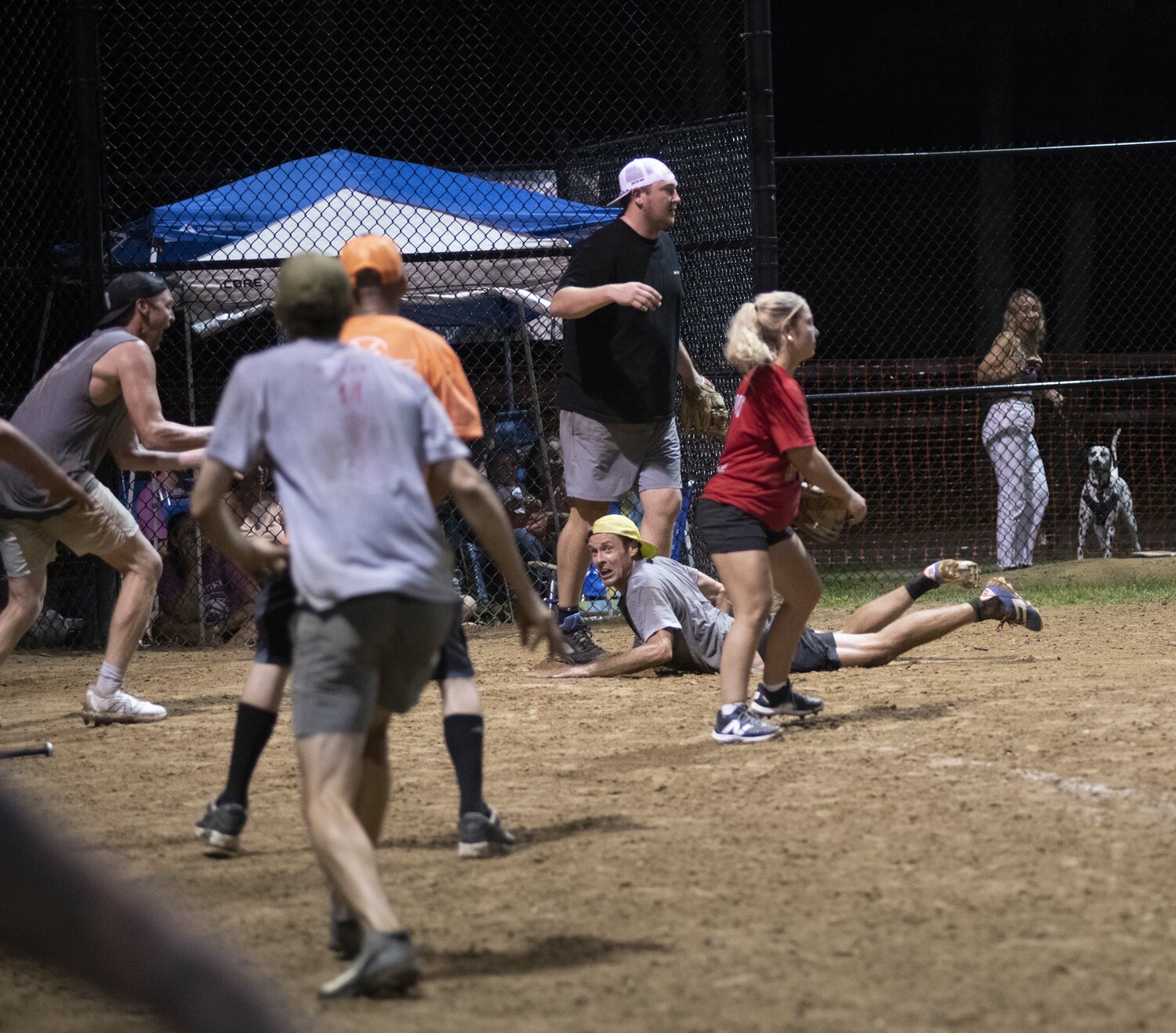 Colin Davis scores the winning run for the Raptors Sunday night.   DOUG KUNTZ