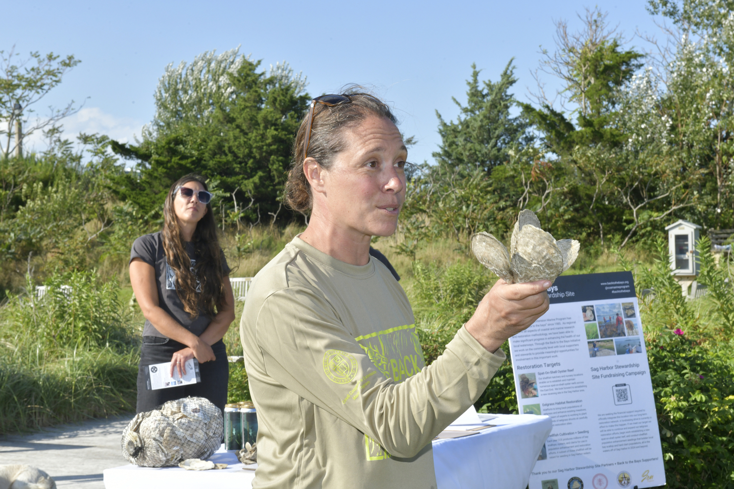 Back to the Bays Aquaculture Coordinator Kate Rossi-Snook describes the workings of an oyster reef.   DANA SHAW