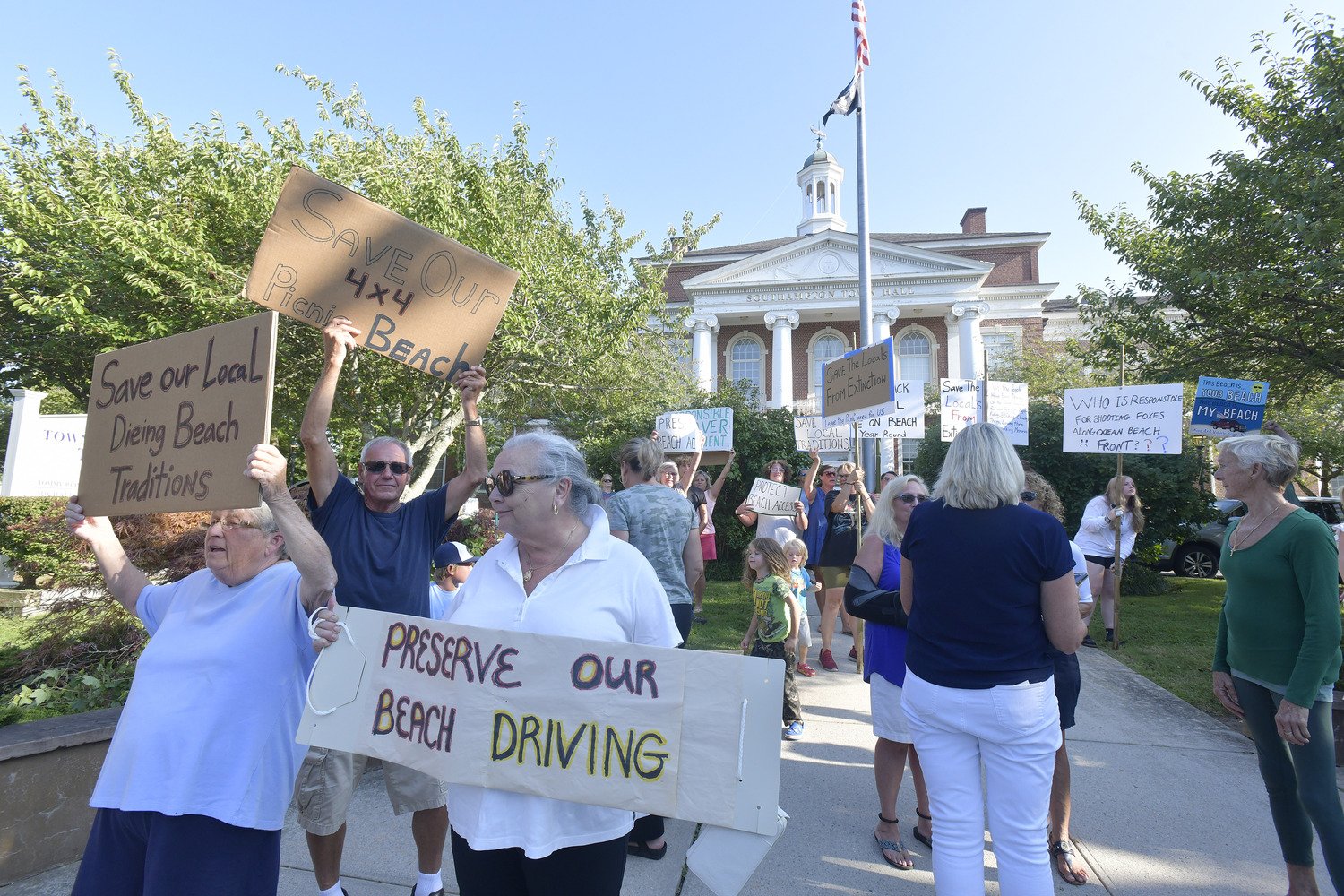 Frequenters of the Southampton Village beach known as the Picnic Area rallied outside Southampton Town Hall on Tuesday afternoon, then pleaded with the Southampton Town Board to find a way to amend the town’s piping plover protection program after the birds left their favorite summer haunt essentially off limits from early June through August 13.   DANA SHAW