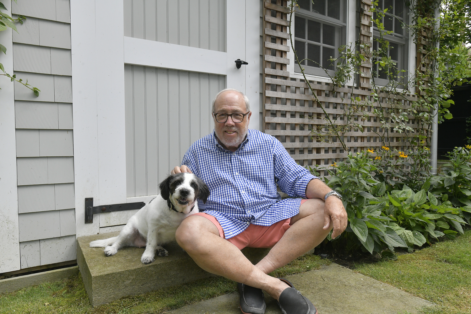 Ed Hollander in his Sag Harbor garden.  DANA SHAW