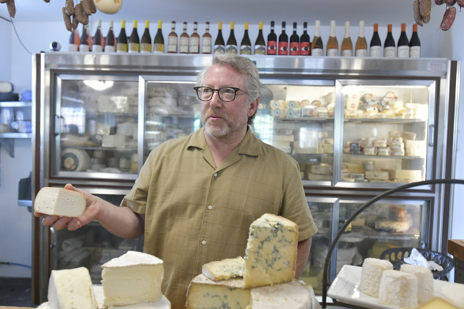 Michael Cavaniola at Cavaniola’s Gourmet Cheese Shop in Sag Harbor.  DANA SHAW