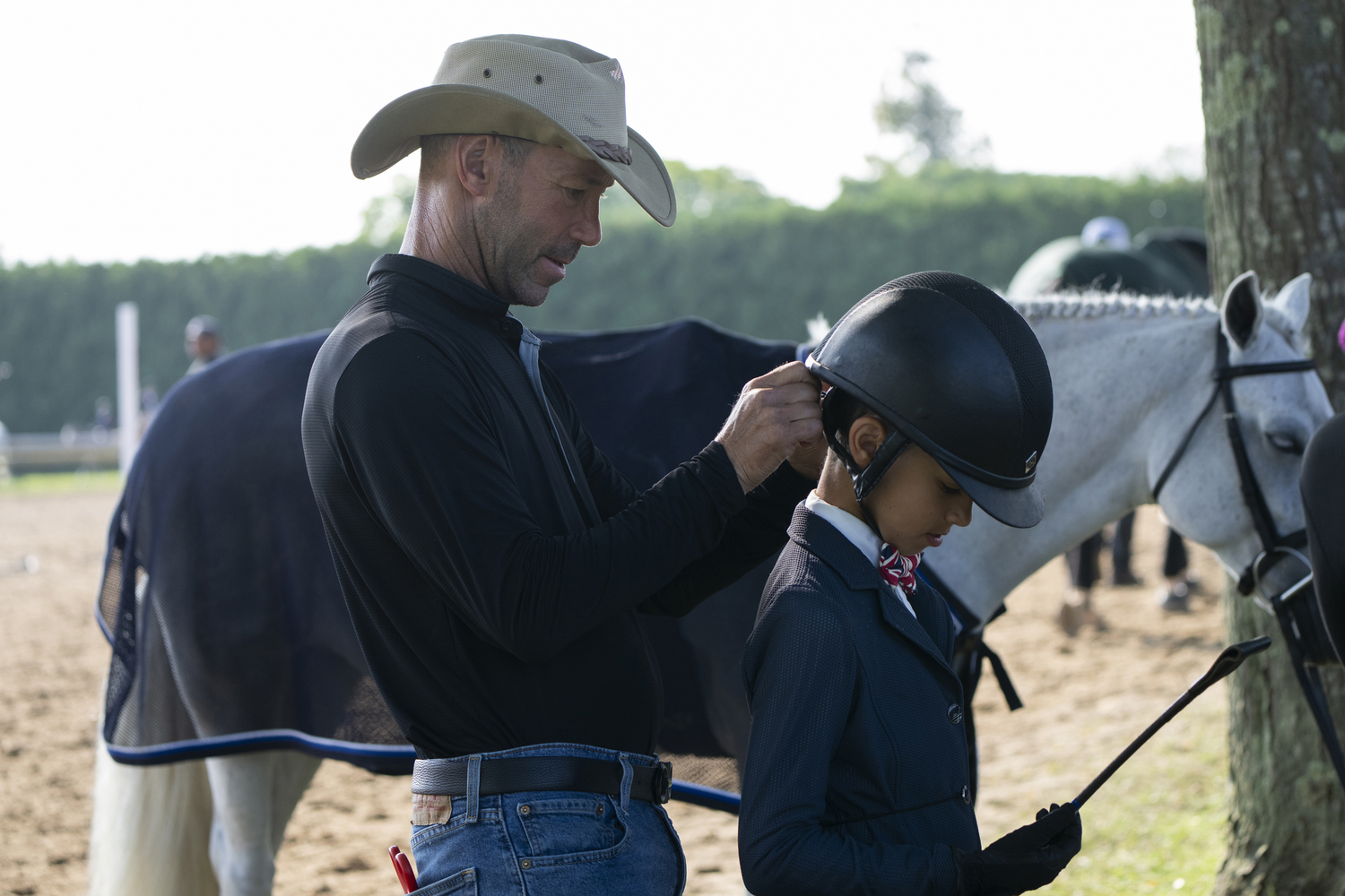 Michael Zuckerman and his son Zachary Zuckerman at The Hampton Classic on Monday.   LORI HAWKINS