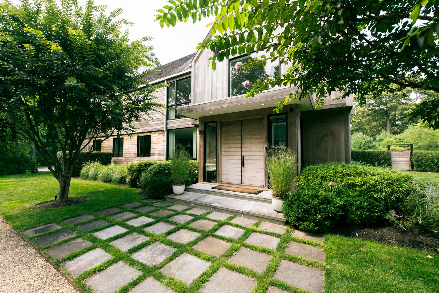 The cedar facade brings unity to its surrounding. MACRAE MARRAN