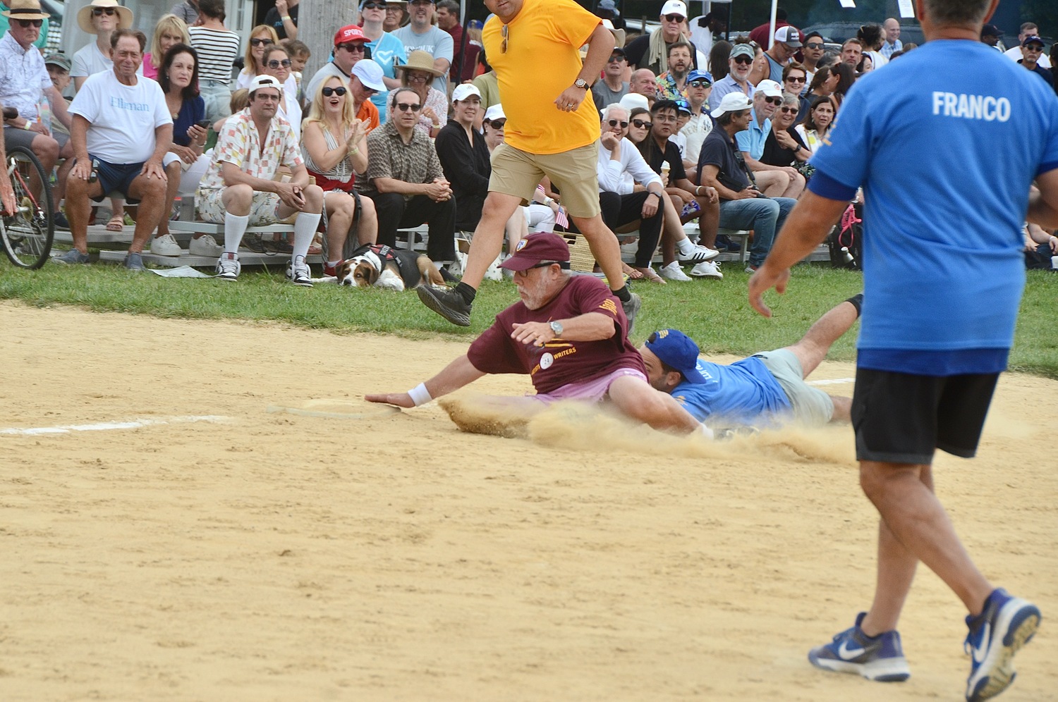 Ed Hollander sneaks under the tag at third base.  KYRIL BROMLEY