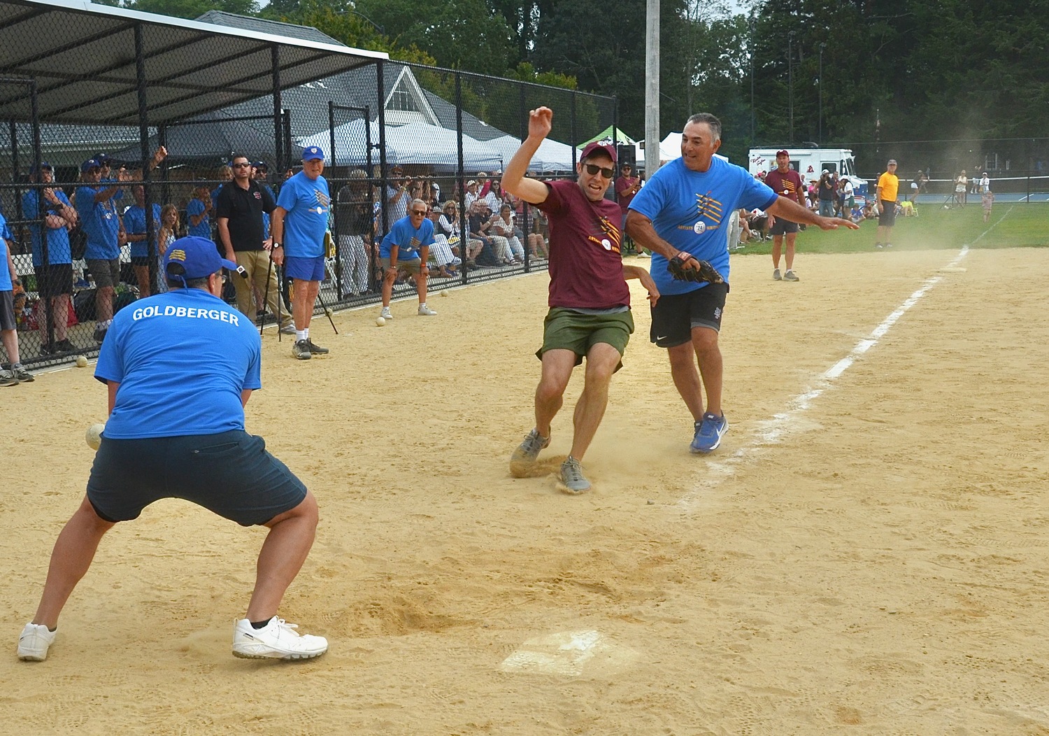 A play at the plate!   KYRIL BROMLEY