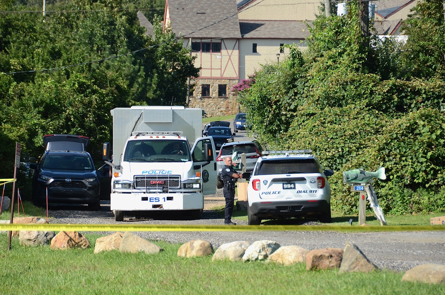 Police block the roadway earlier this afternoon during an incident on Edgemere Road in Montauk.     KYRIL BROMLEY